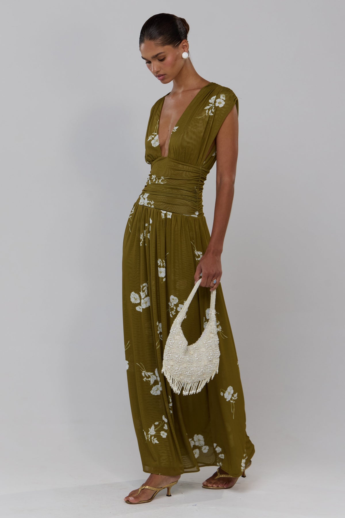 This is an image of Robbie in Moss - RESA featuring a model wearing the dress