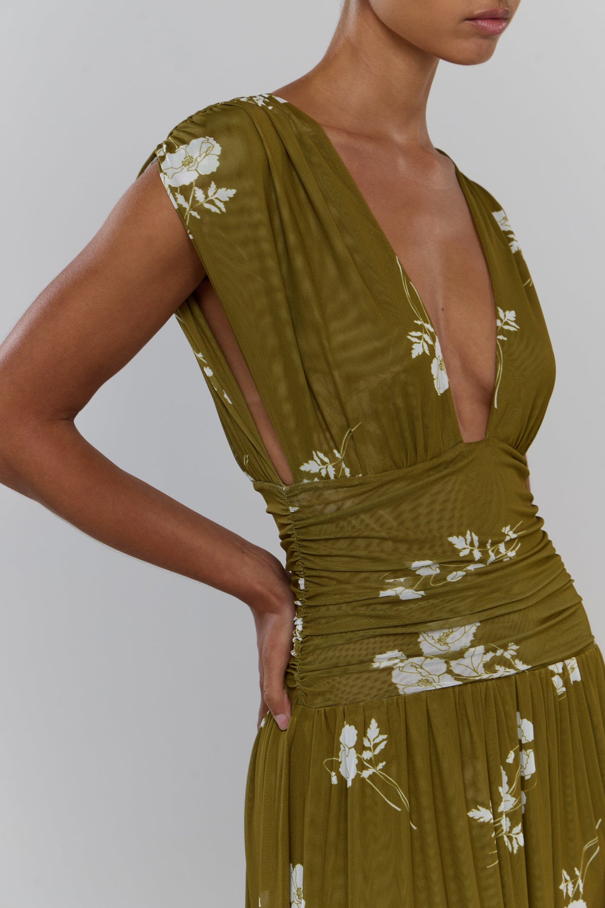 This is an image of Robbie in Moss - RESA featuring a model wearing the dress