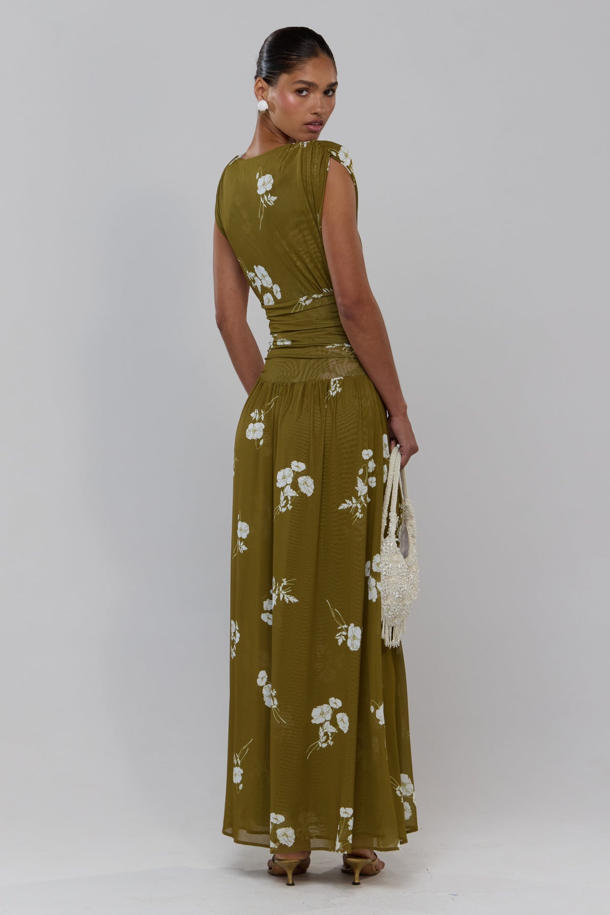 This is an image of Robbie in Moss - RESA featuring a model wearing the dress