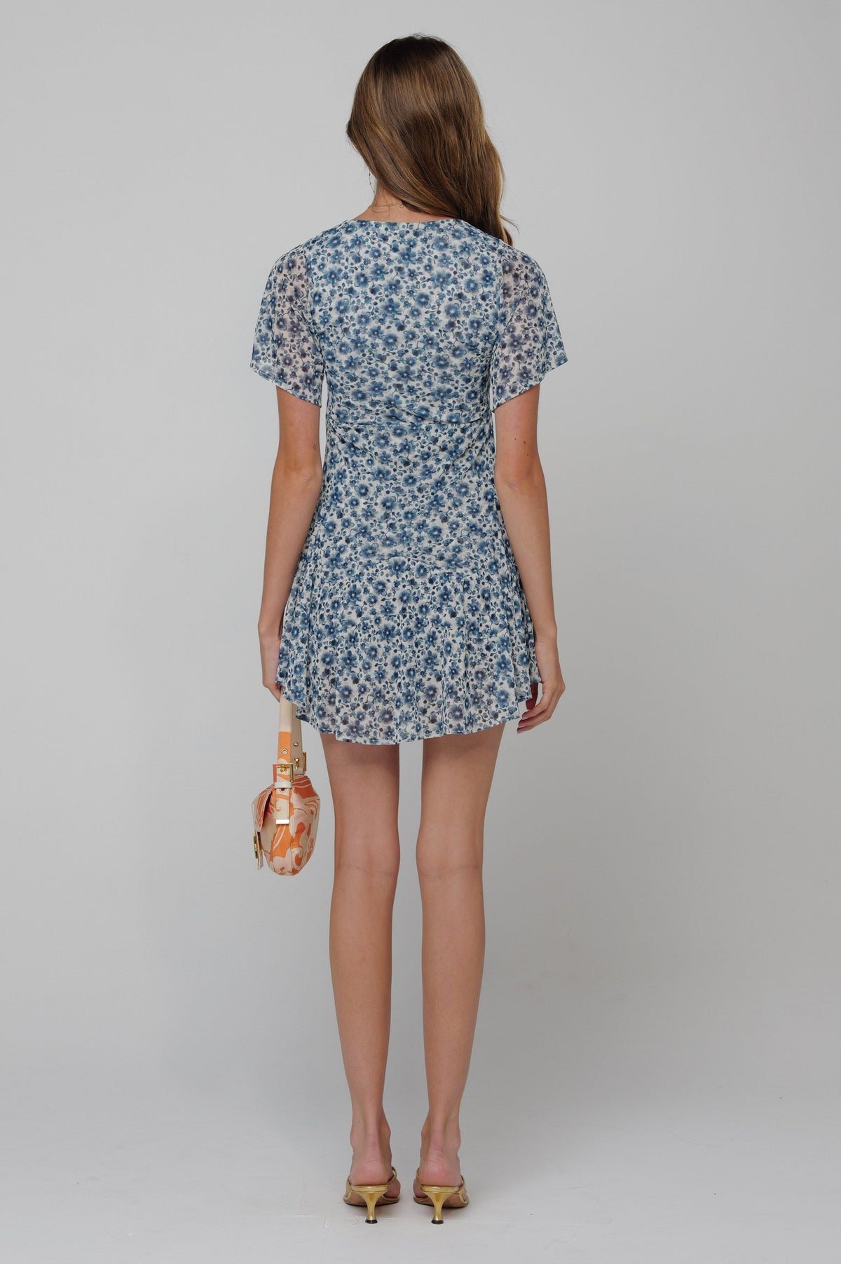 This is an image of Romy Romper in Wrangler - RESA featuring a model wearing the dress
