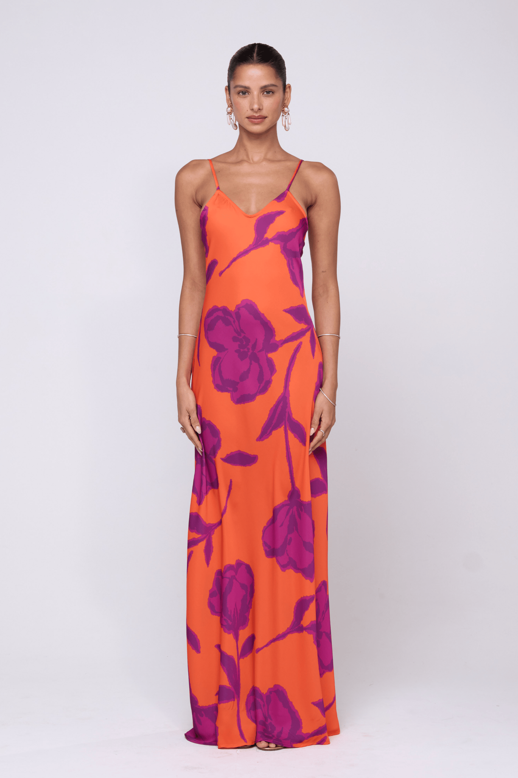 This is an image of Rose Dress in Mandarin - RESA featuring a model wearing the dress