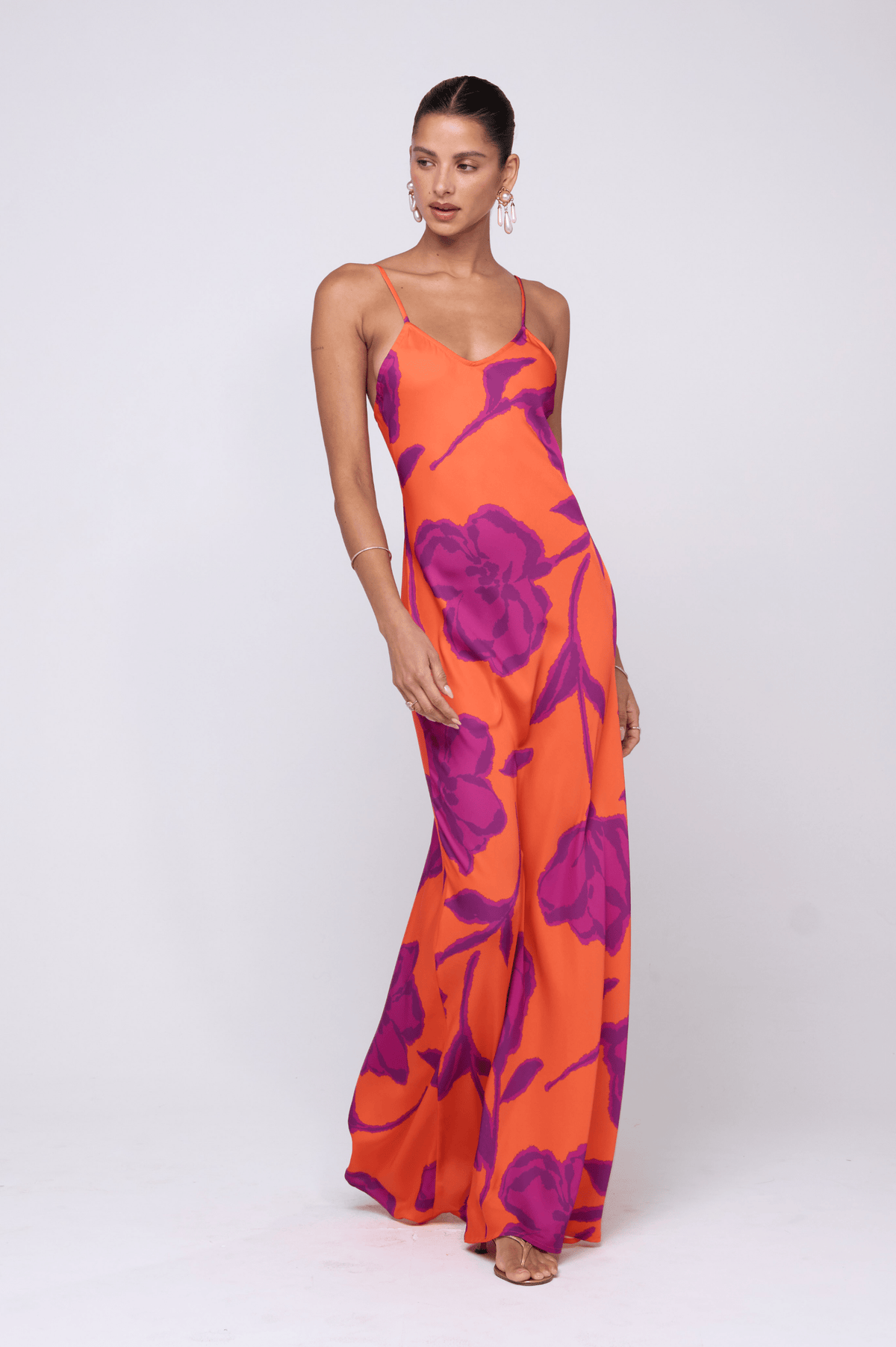 This is an image of Rose Dress in Mandarin - RESA featuring a model wearing the dress
