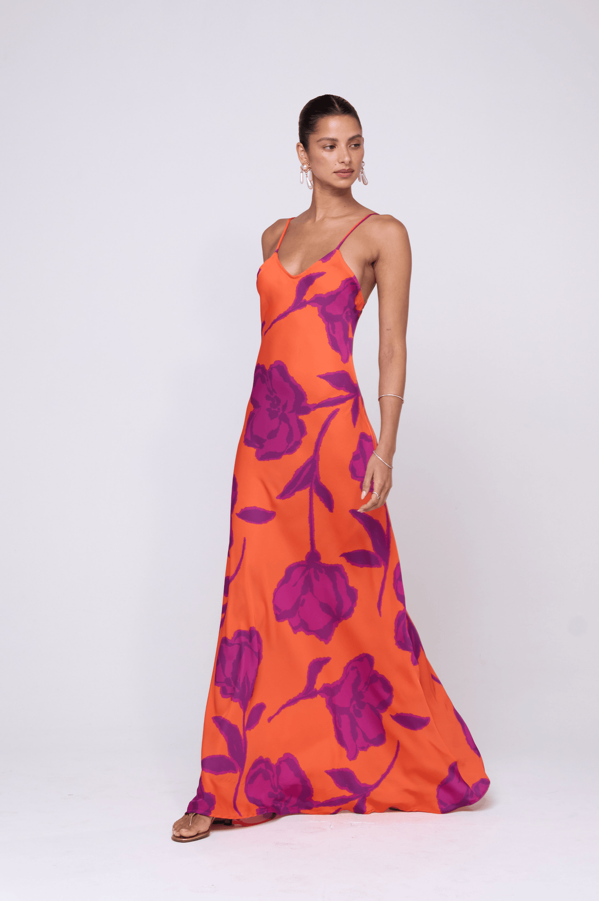 This is an image of Rose Dress in Mandarin - RESA featuring a model wearing the dress