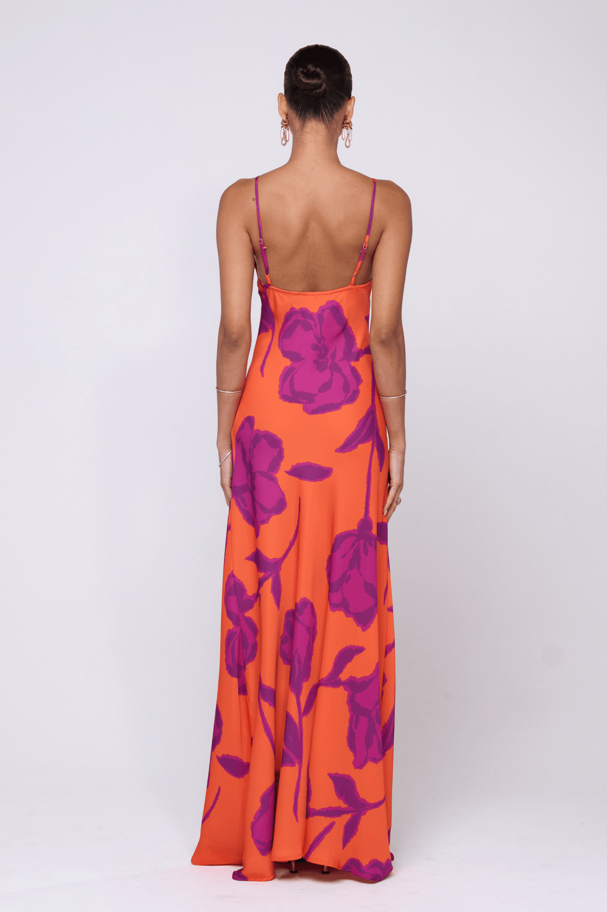 This is an image of Rose Dress in Mandarin - RESA featuring a model wearing the dress