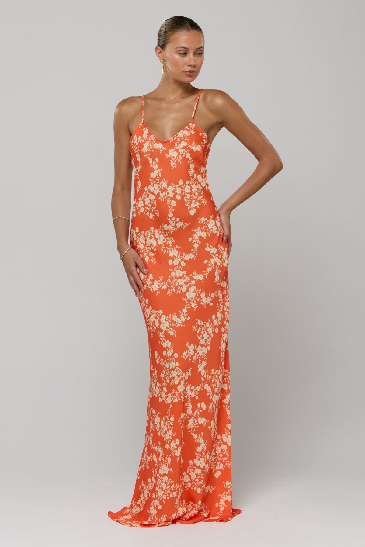 This is an image of Rose Maxi in Orange Blossom - RESA featuring a model wearing the dress