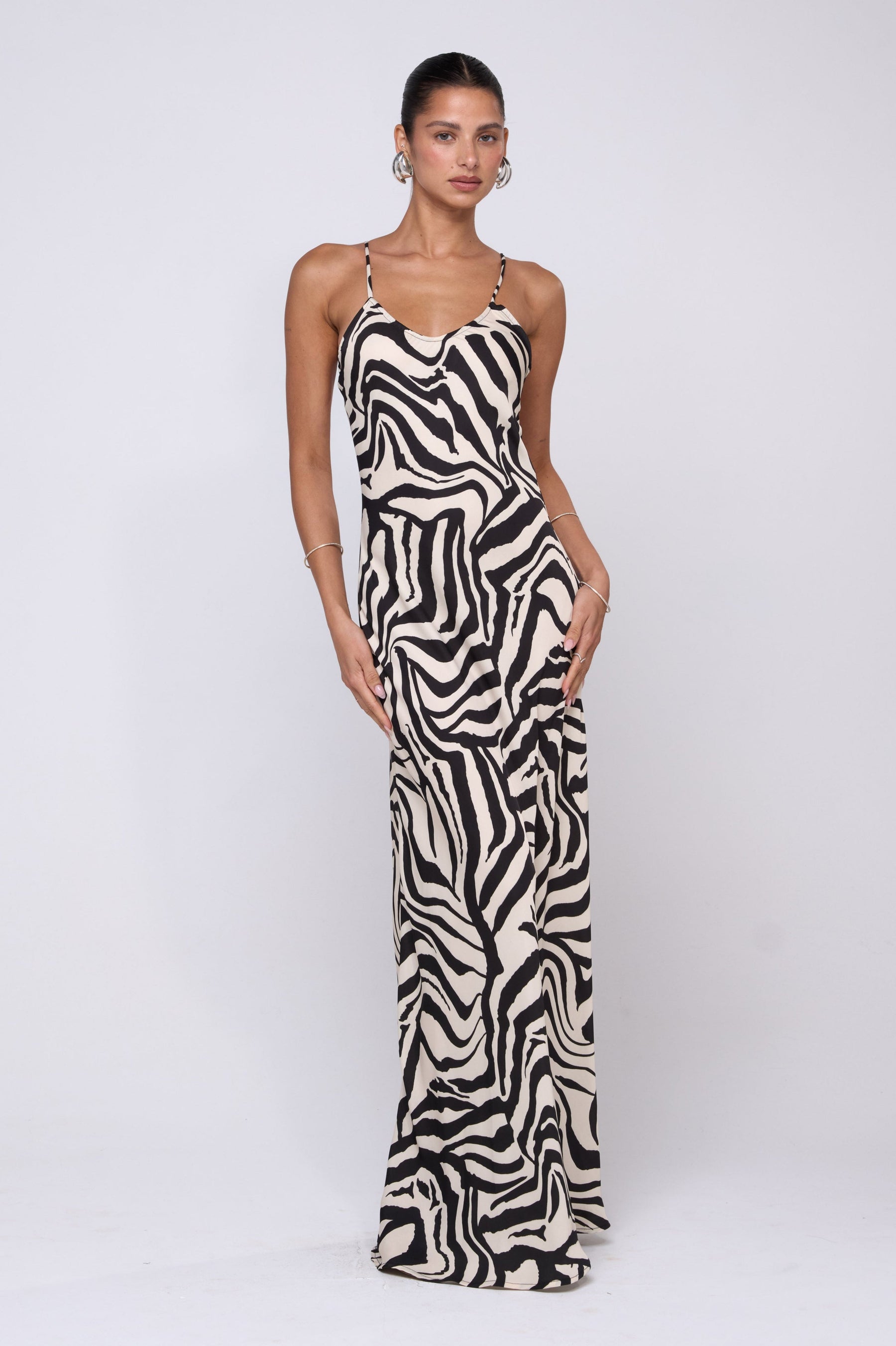 This is an image of Rose Maxi in Tigris - RESA featuring a model wearing the dress