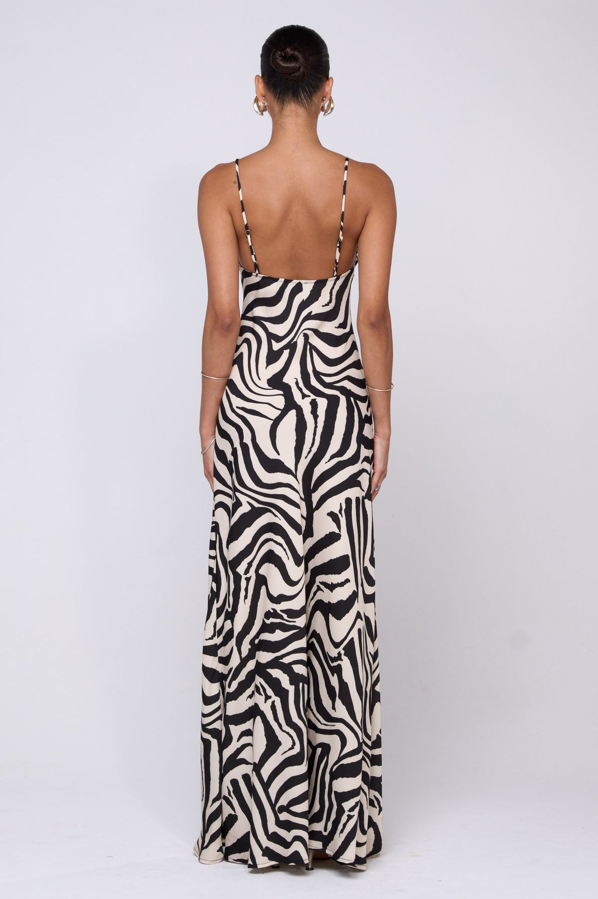 This is an image of Rose Maxi in Tigris - RESA featuring a model wearing the dress