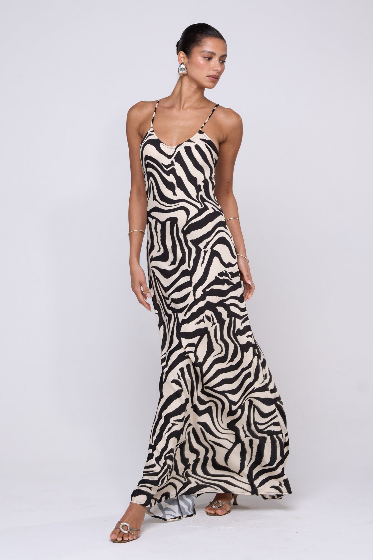 This is an image of Rose Maxi in Tigris - RESA featuring a model wearing the dress