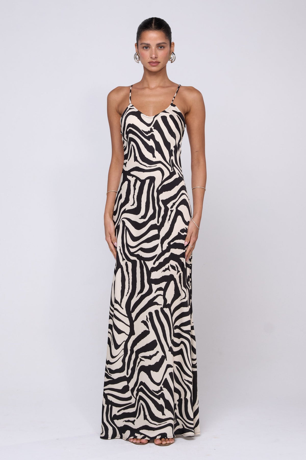This is an image of Rose Maxi in Tigris - RESA featuring a model wearing the dress