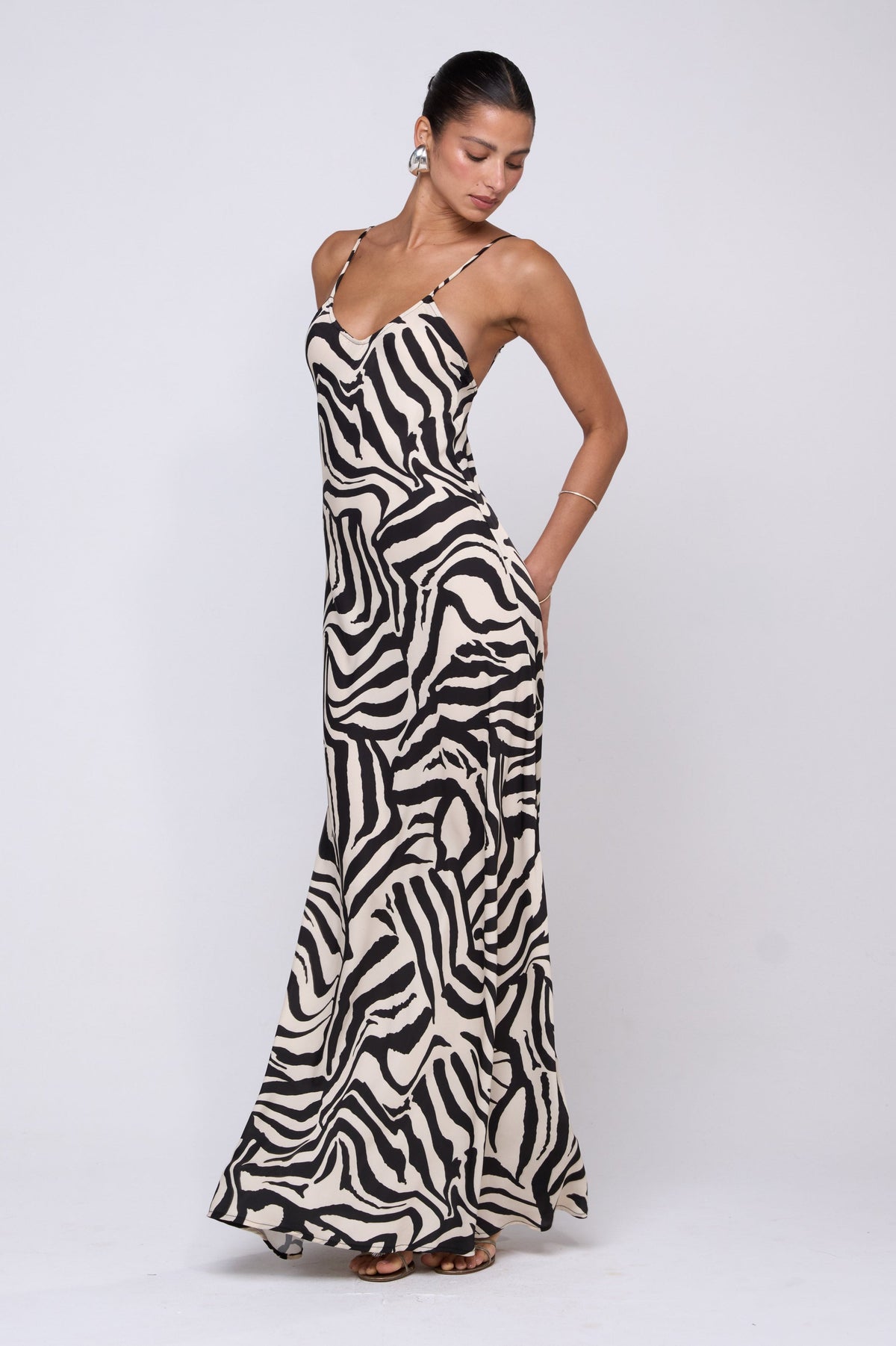 This is an image of Rose Maxi in Tigris - RESA featuring a model wearing the dress