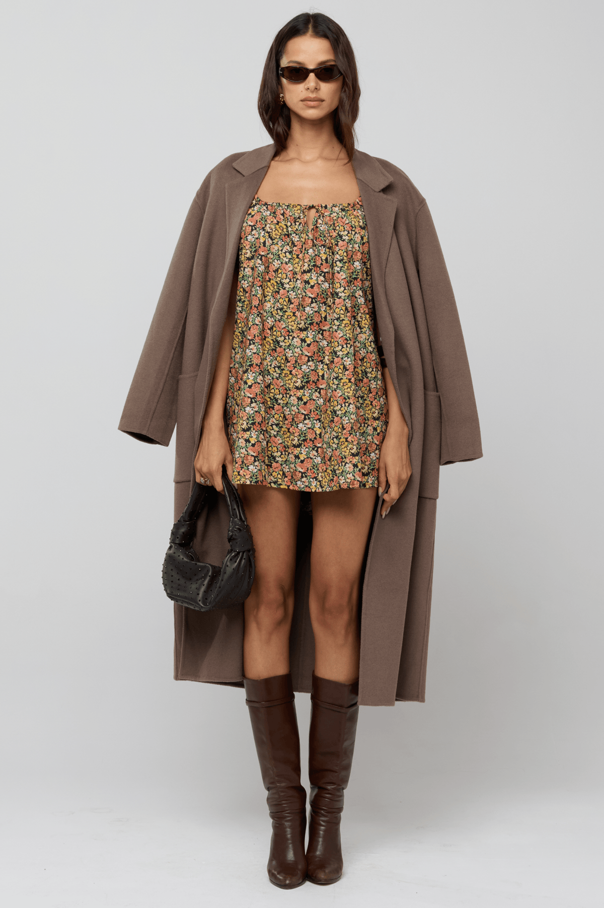 This is an image of Ryder Coat in Taupe - RESA featuring a model wearing the dress