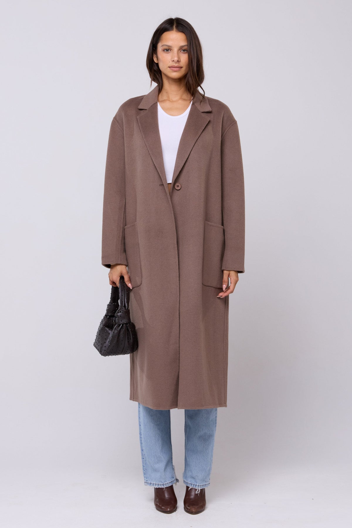 This is an image of Ryder Coat in Taupe - RESA featuring a model wearing the dress
