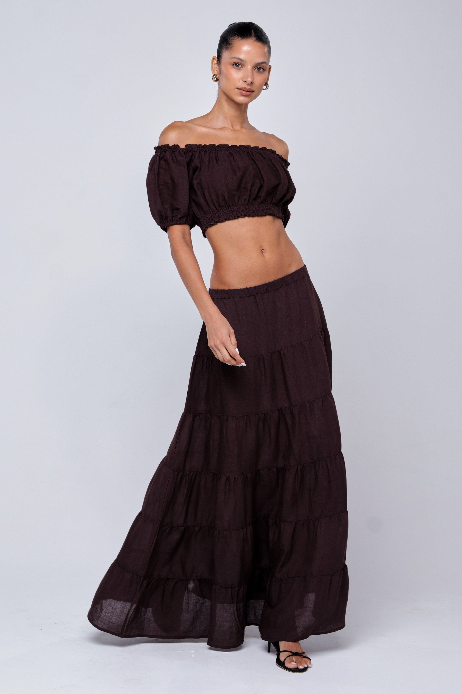 This is an image of Saige Top in Brown Linen - RESA featuring a model wearing the dress