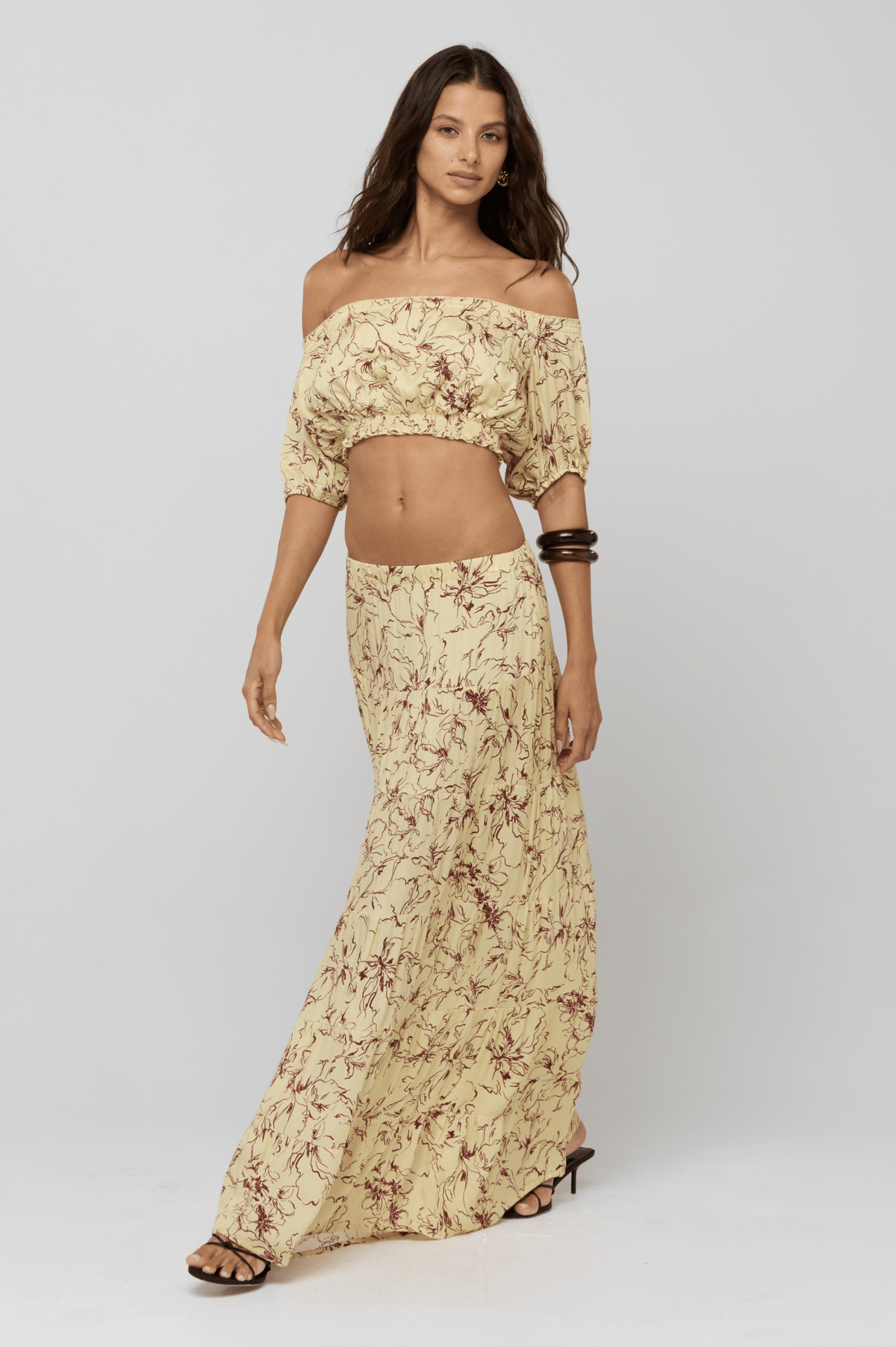 This is an image of Saige Top in Butterscotch - RESA featuring a model wearing the dress