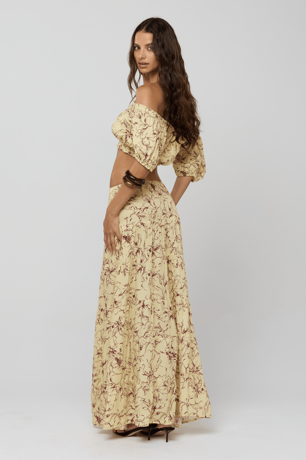 This is an image of Saige Top in Butterscotch - RESA featuring a model wearing the dress