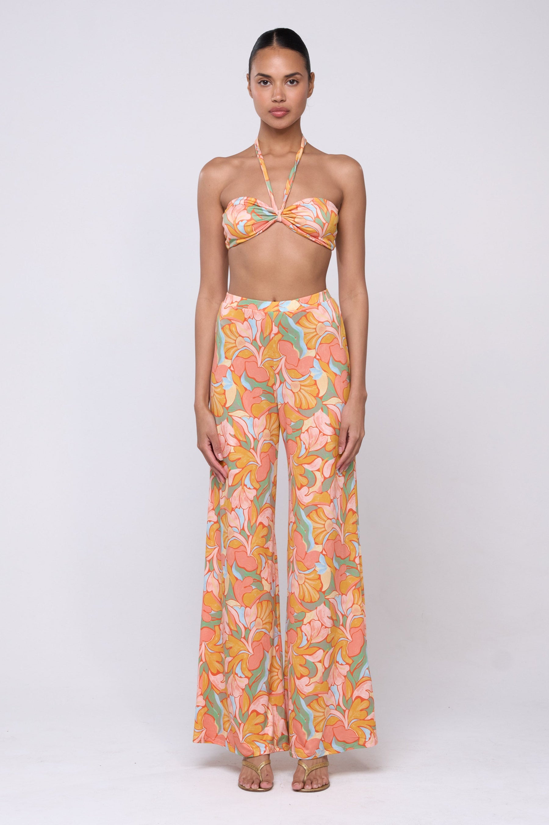 This is an image of Santorni Set in Seychelles - Archive - RESA featuring a model wearing the dress