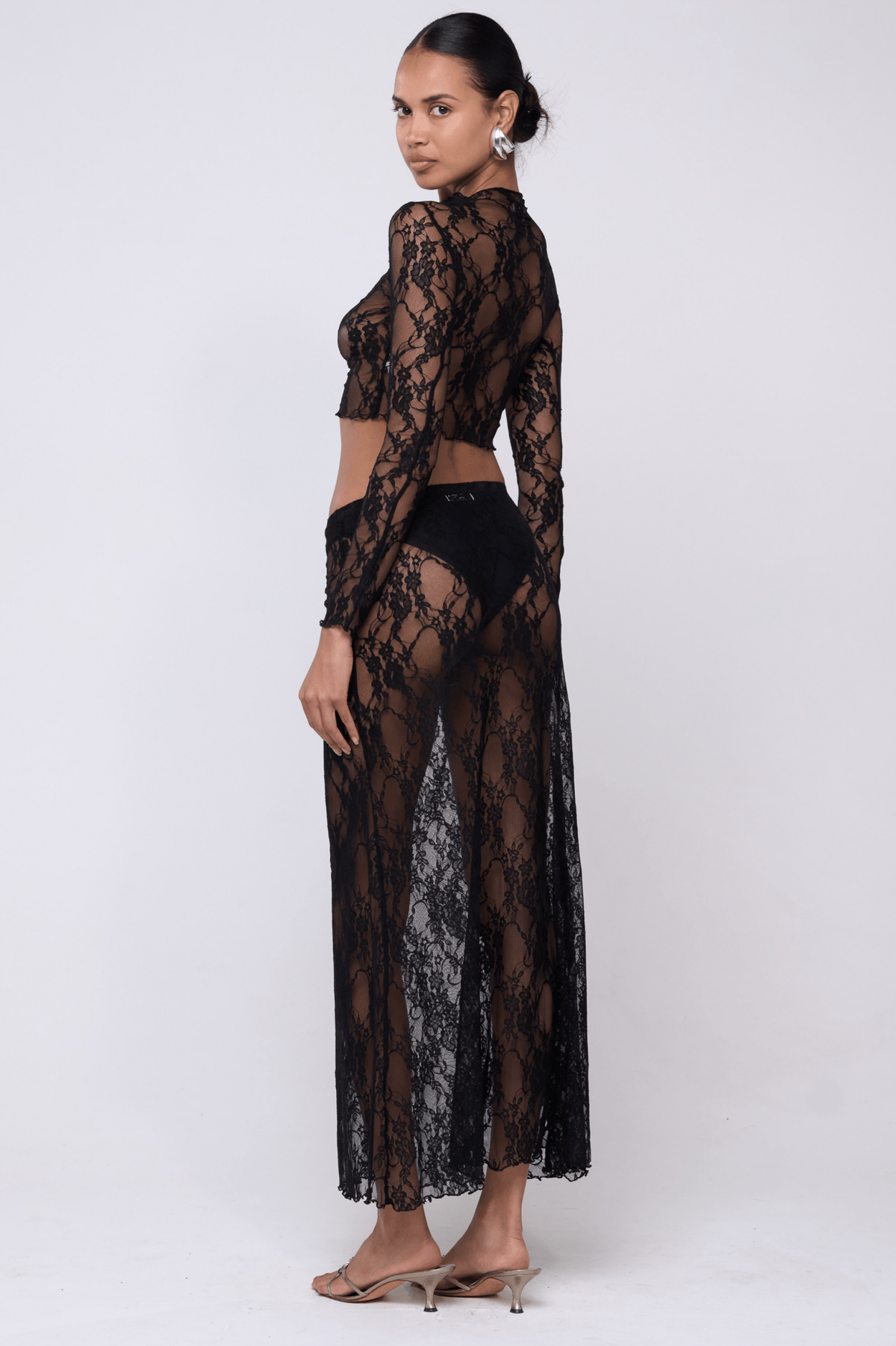 This is an image of Sarah Skirt in Black Lace - RESA featuring a model wearing the dress