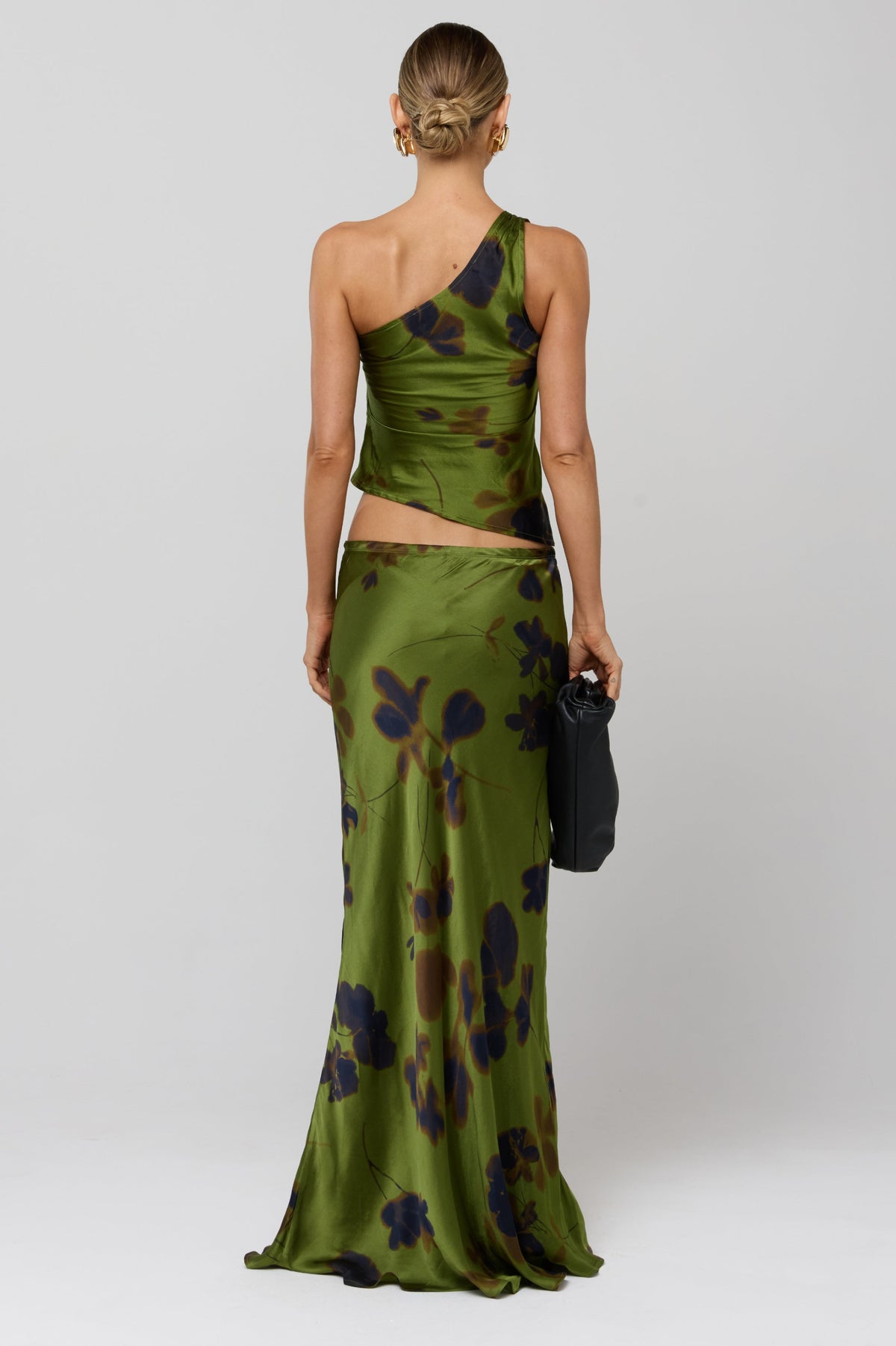 This is an image of Sarah Skirt in Evergreen - RESA featuring a model wearing the dress