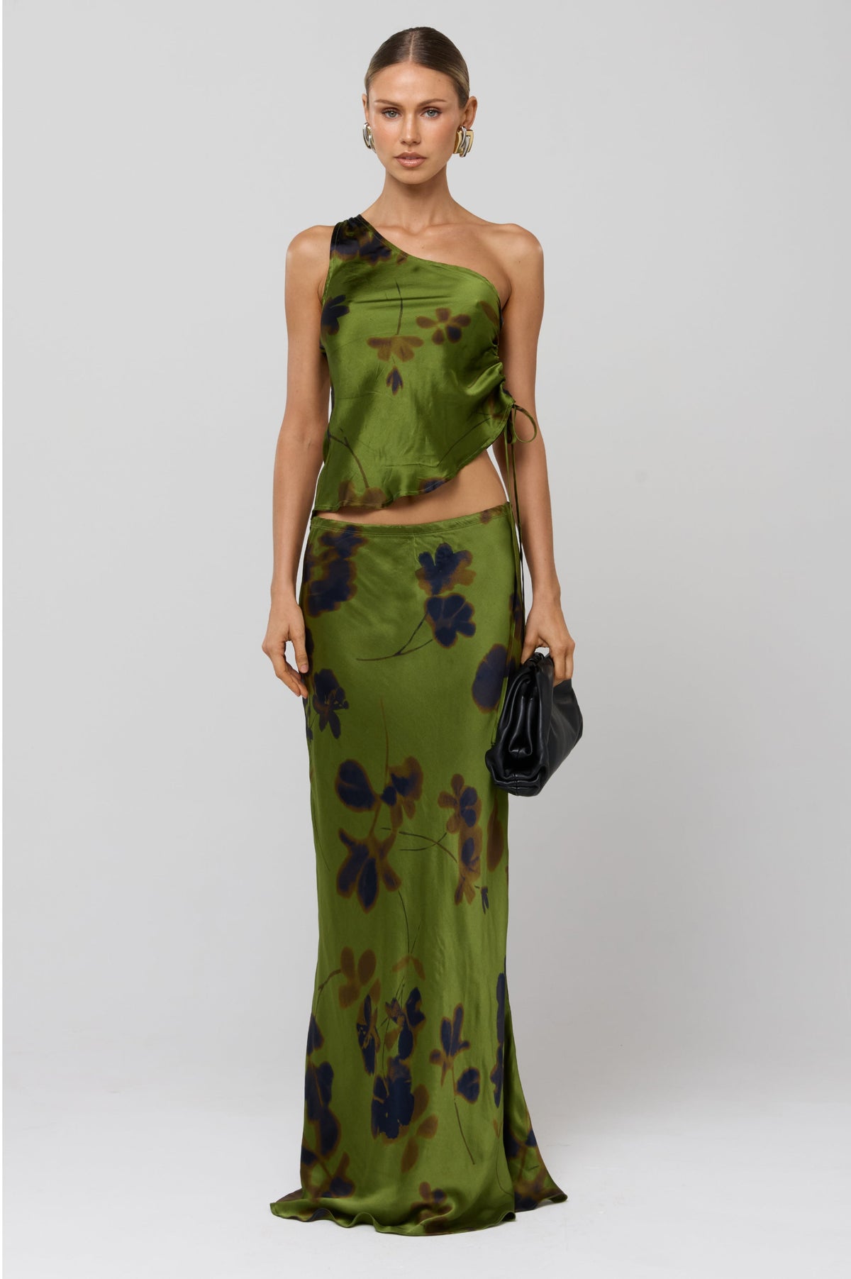 This is an image of Sarah Skirt in Evergreen - RESA featuring a model wearing the dress