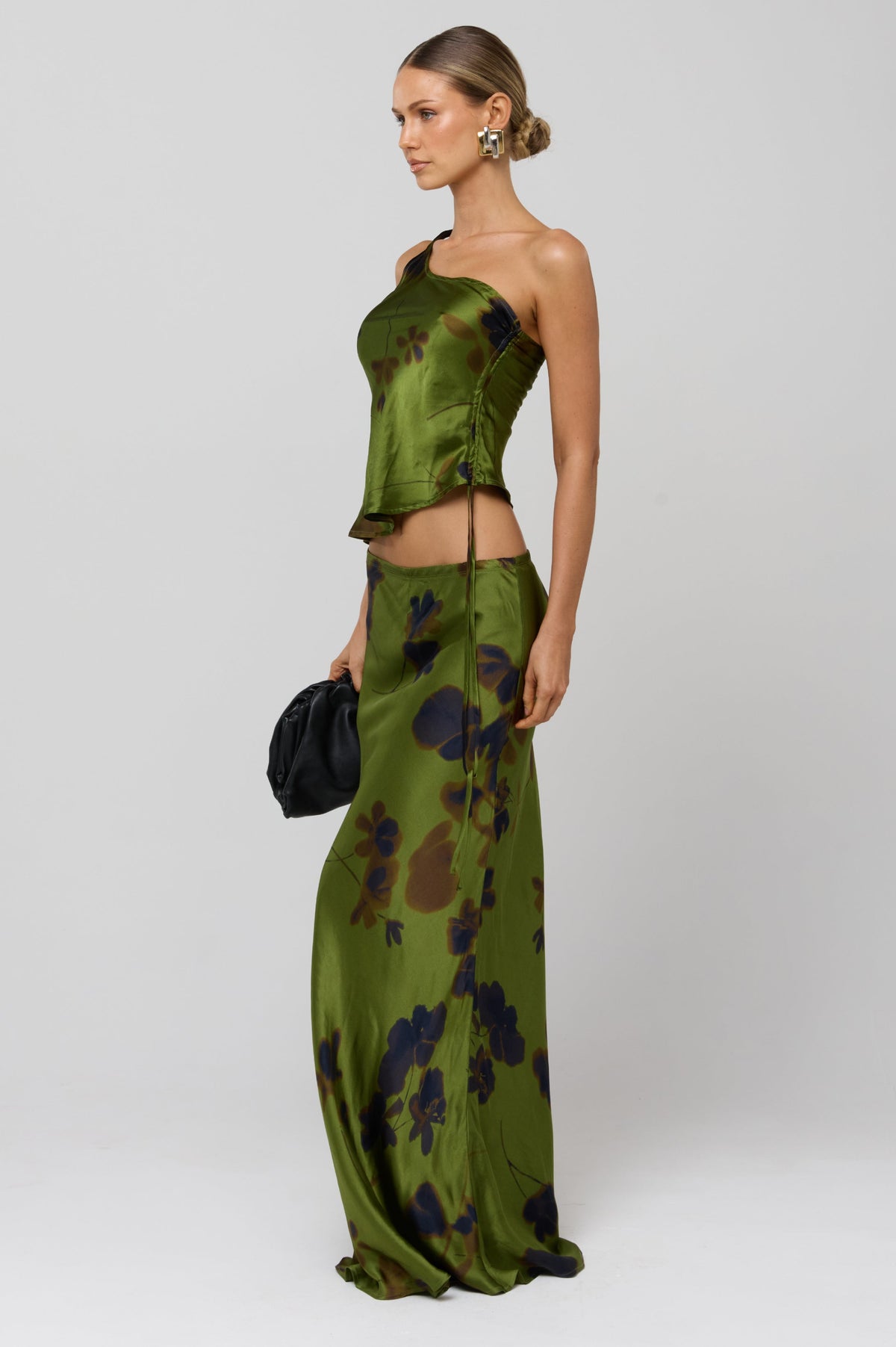This is an image of Sarah Skirt in Evergreen - RESA featuring a model wearing the dress