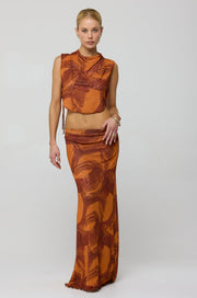 This is an image of Sarah Skirt in Flame - RESA featuring a model wearing the dress