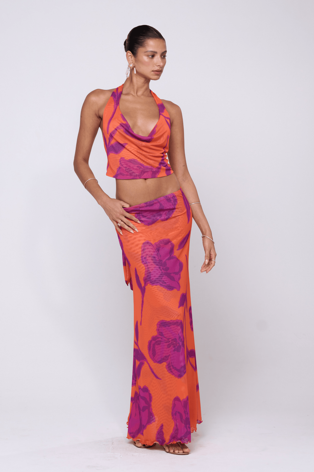 This is an image of Sarah Skirt in Mandarin - RESA featuring a model wearing the dress