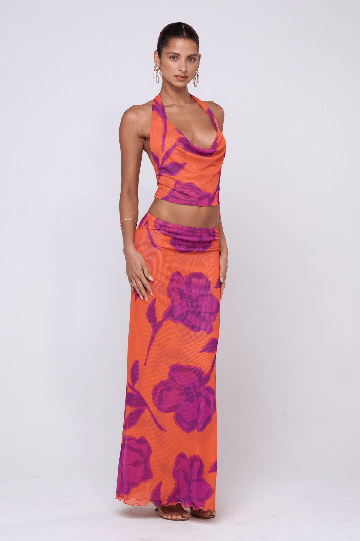 This is an image of Sarah Skirt in Mandarin - RESA featuring a model wearing the dress