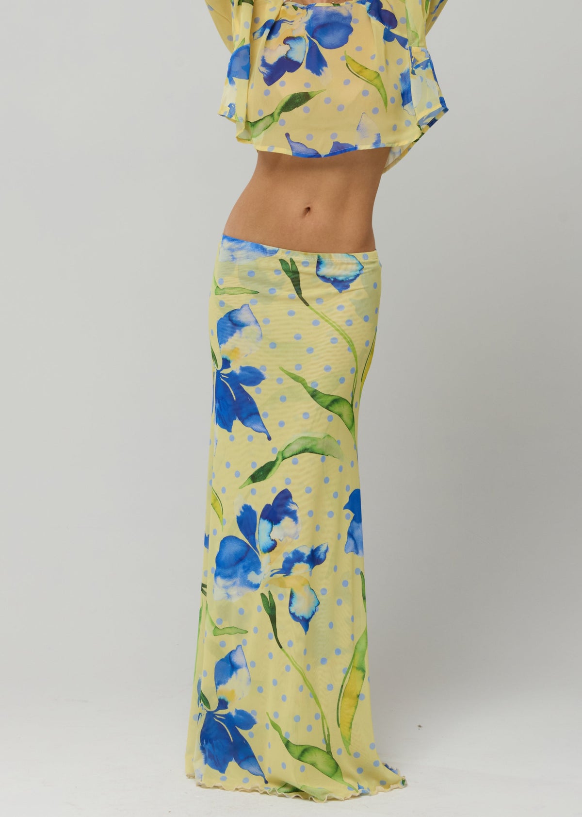 This is an image of Sarah Skirt in Solei - RESA featuring a model wearing the dress