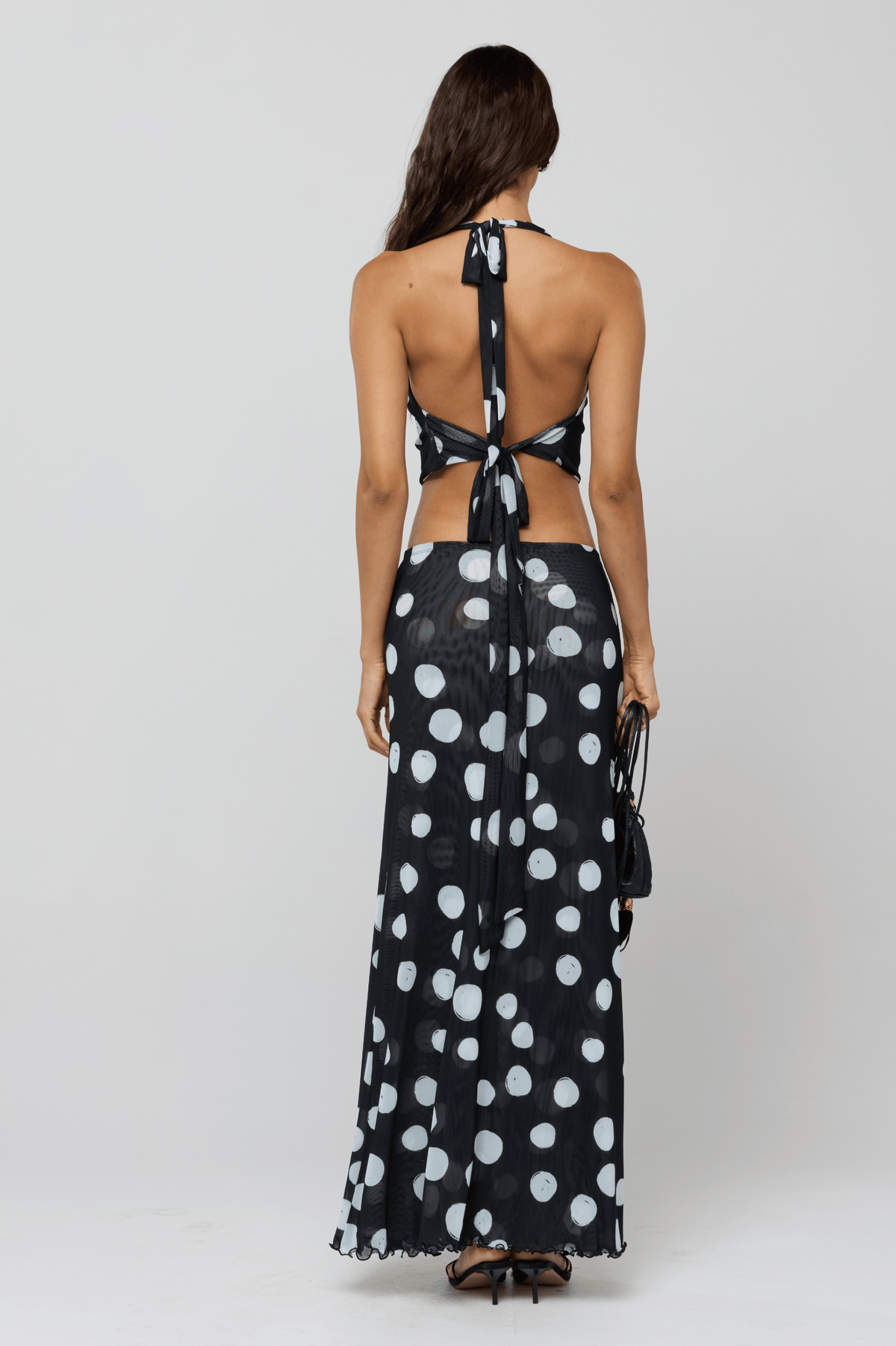 This is an image of Sarah Skirt in Vogue - RESA featuring a model wearing the dress