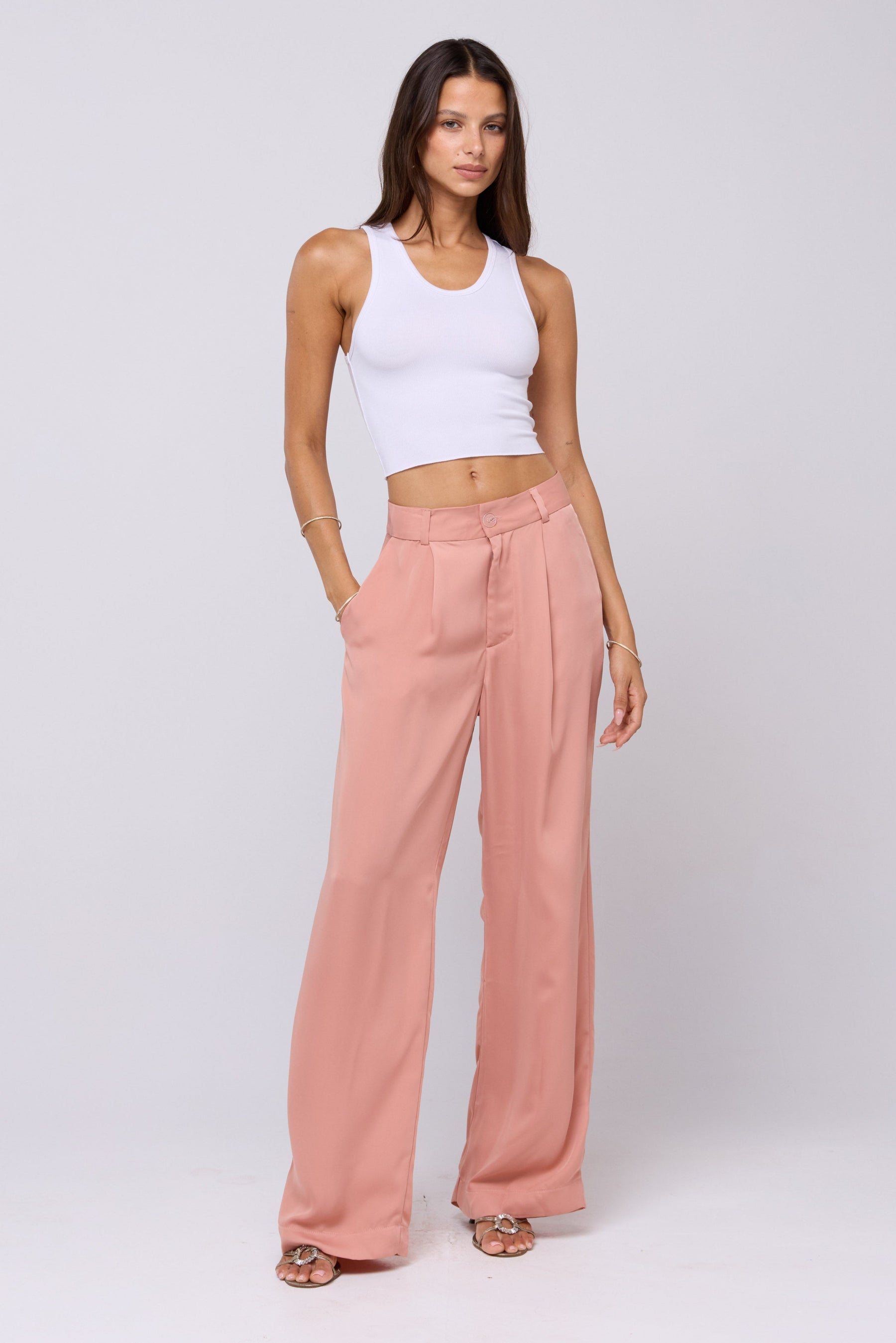 This is an image of Sasha Trouser in Blush - RESA featuring a model wearing the dress