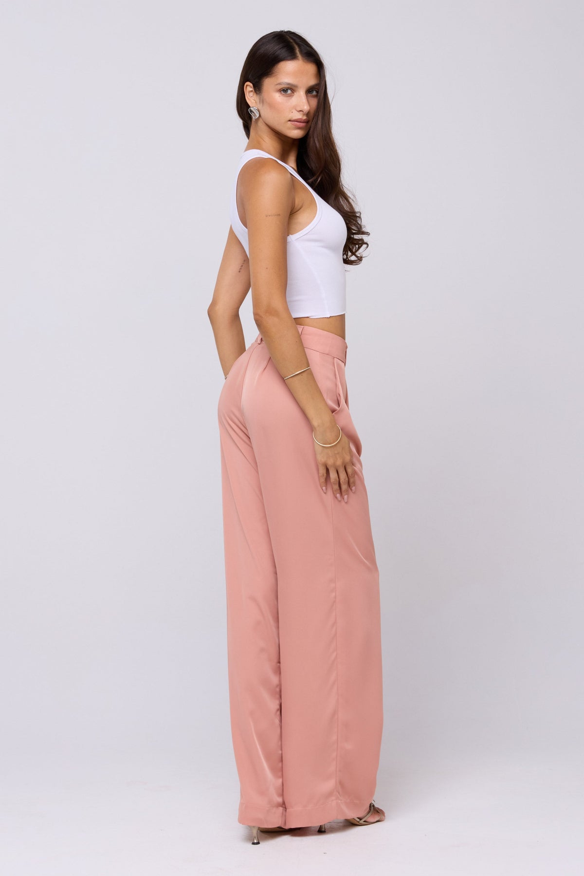 This is an image of Sasha Trouser in Blush - RESA featuring a model wearing the dress
