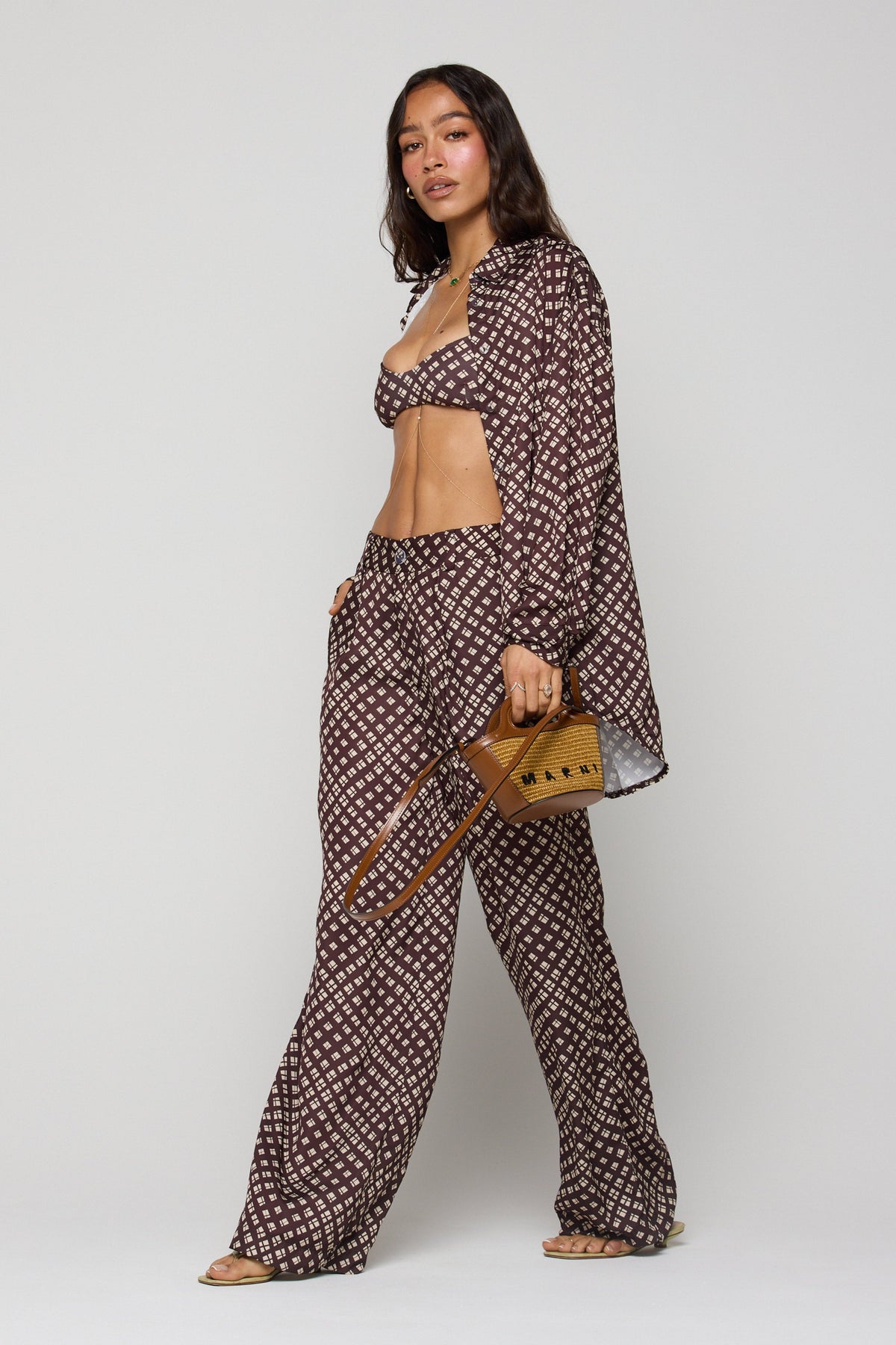 This is an image of Sasha Trouser in Mocha - RESA featuring a model wearing the dress