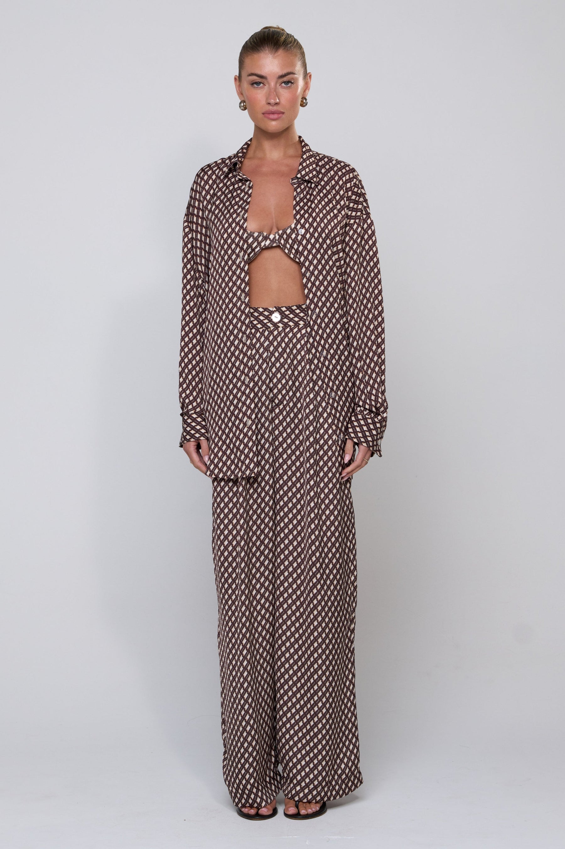 This is an image of Sasha Trouser in Tulum - RESA featuring a model wearing the dress