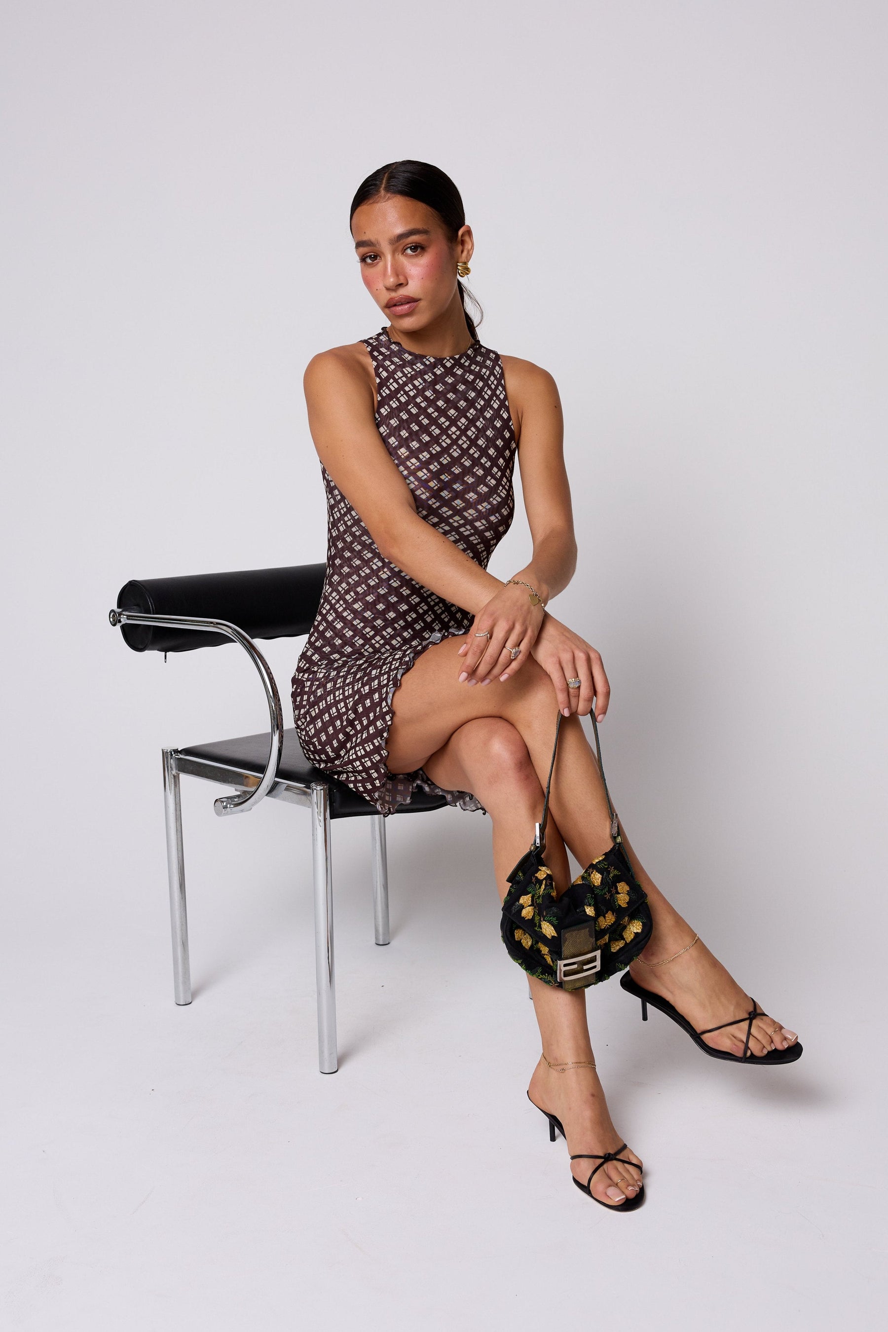 This is an image of Savannah Mini in Mocha - RESA featuring a model wearing the dress