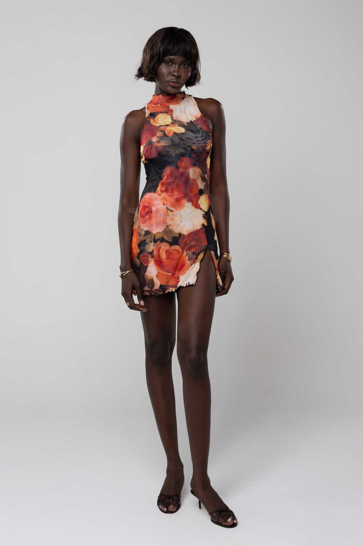 This is an image of Savannah Mini in Muse - RESA featuring a model wearing the dress