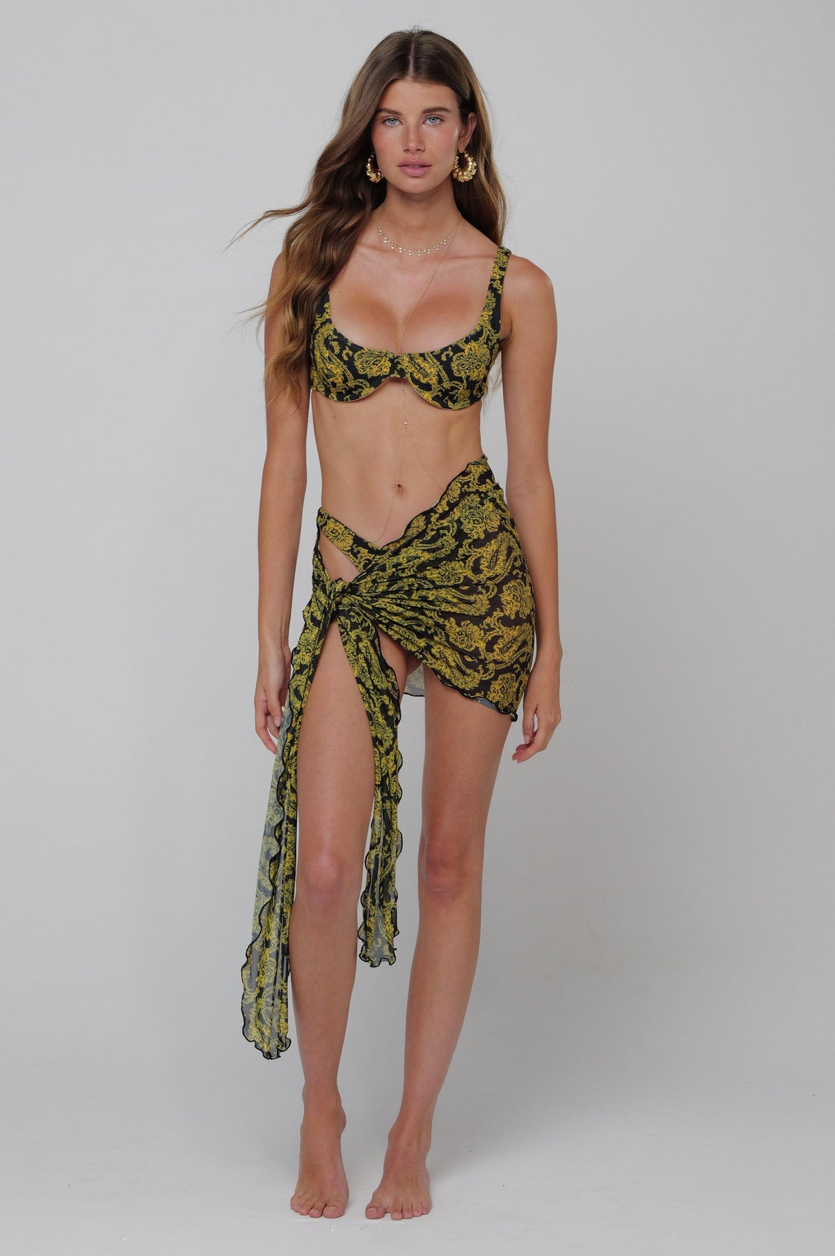 This is an image of Scarf Top in Sorrento - RESA featuring a model wearing the dress