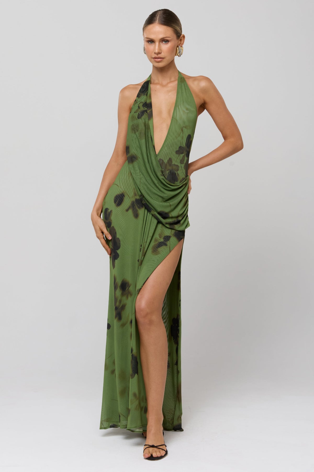 This is an image of Scarlett Dress in Evergreen - RESA featuring a model wearing the dress