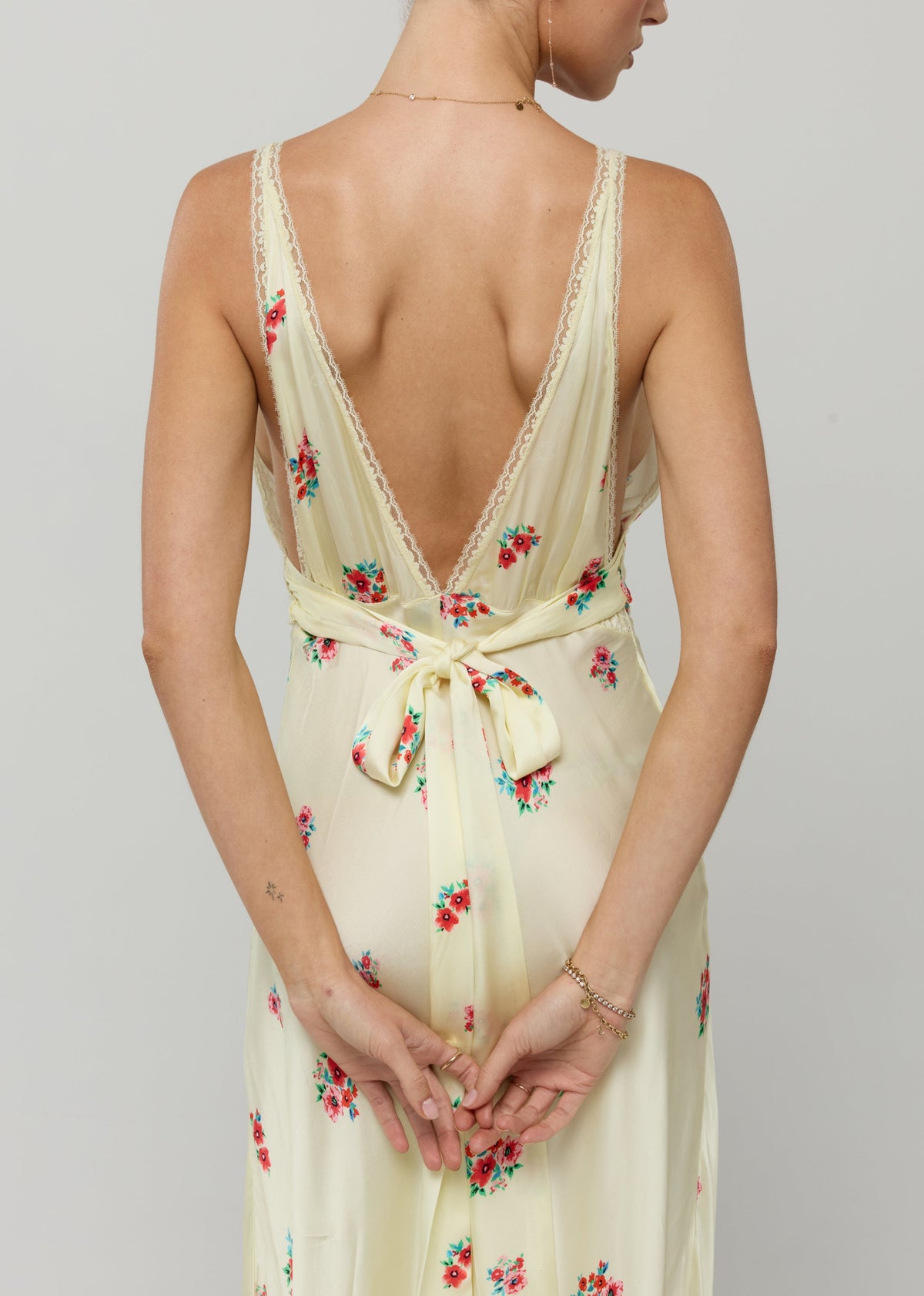 This is an image of Selena Dress in Bliss - RESA featuring a model wearing the dress
