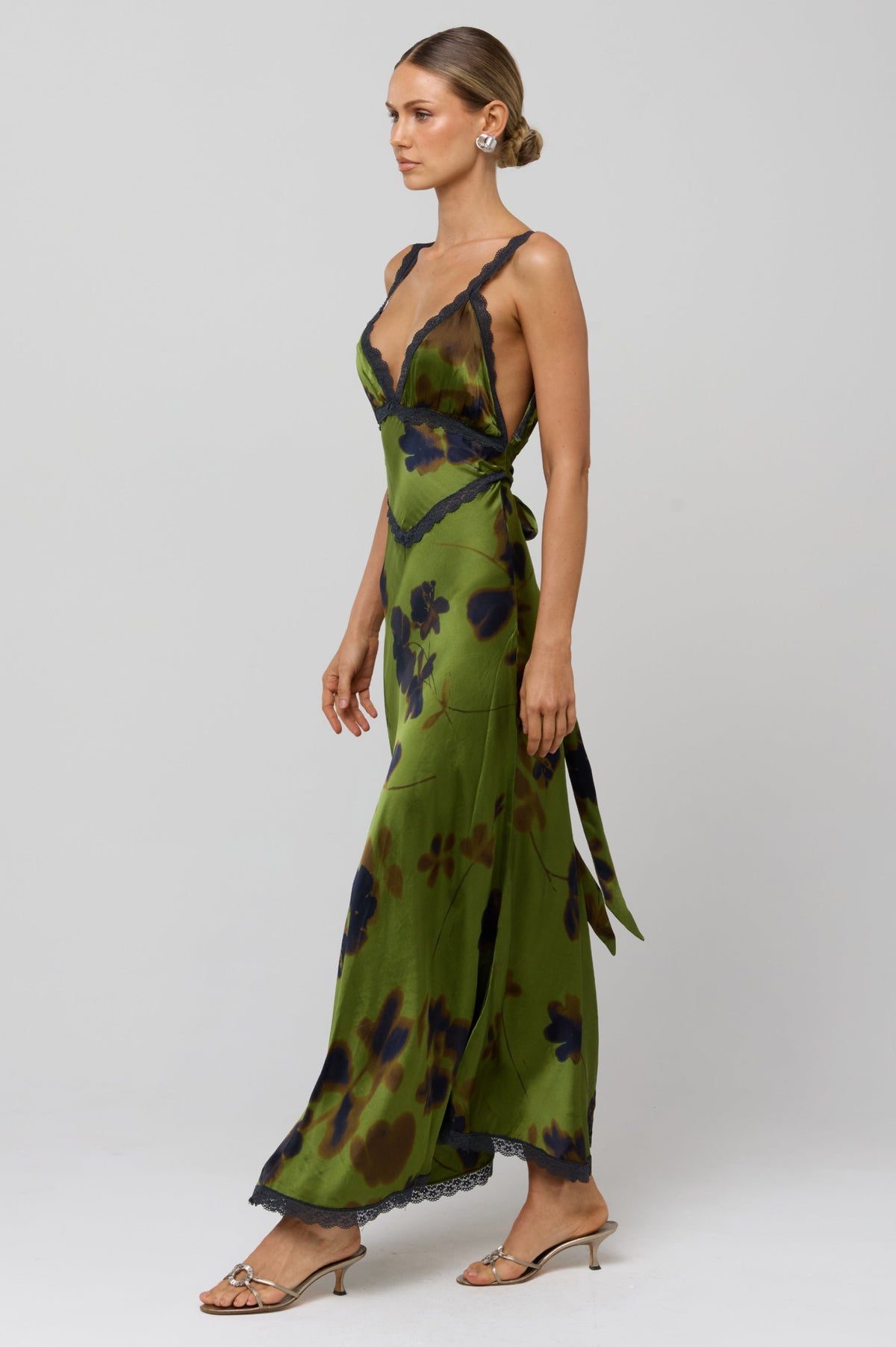 This is an image of Selena Dress in Evergreen - RESA featuring a model wearing the dress