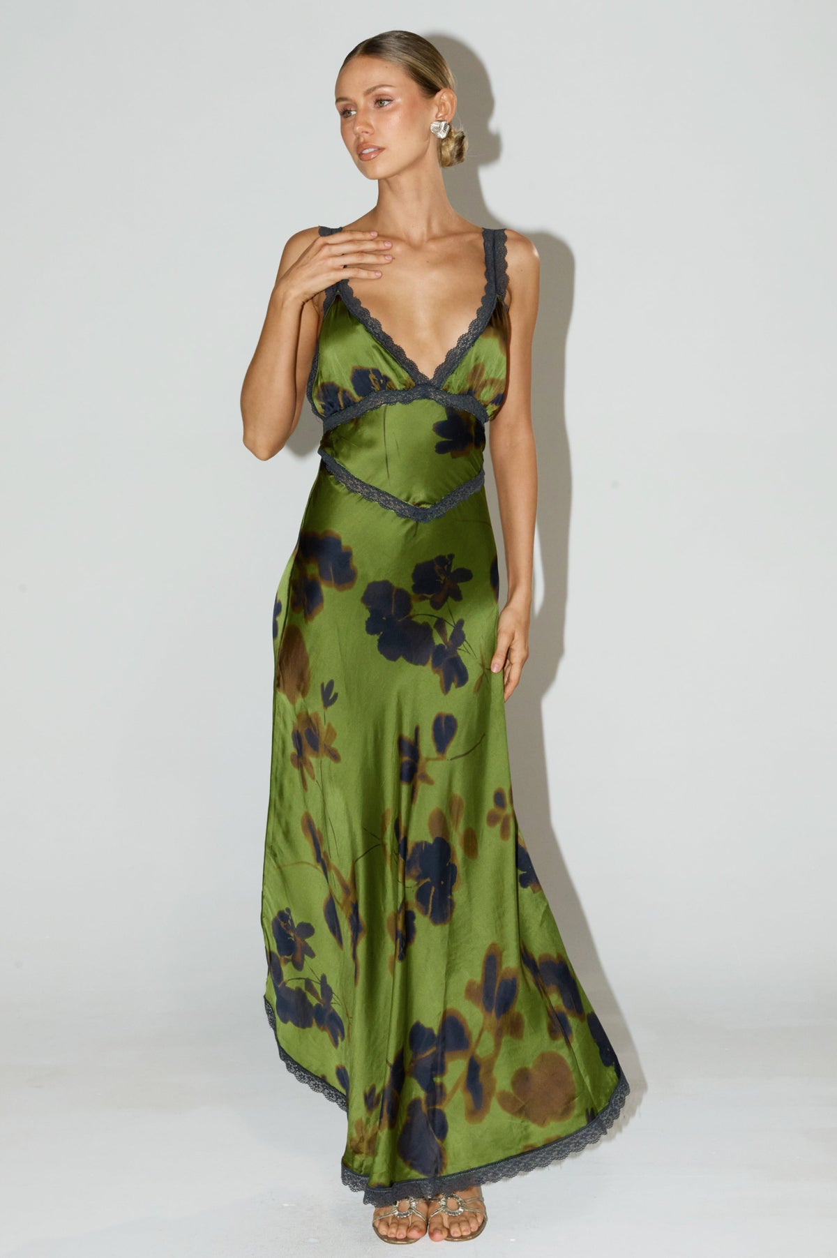 This is an image of Selena Dress in Evergreen - RESA featuring a model wearing the dress