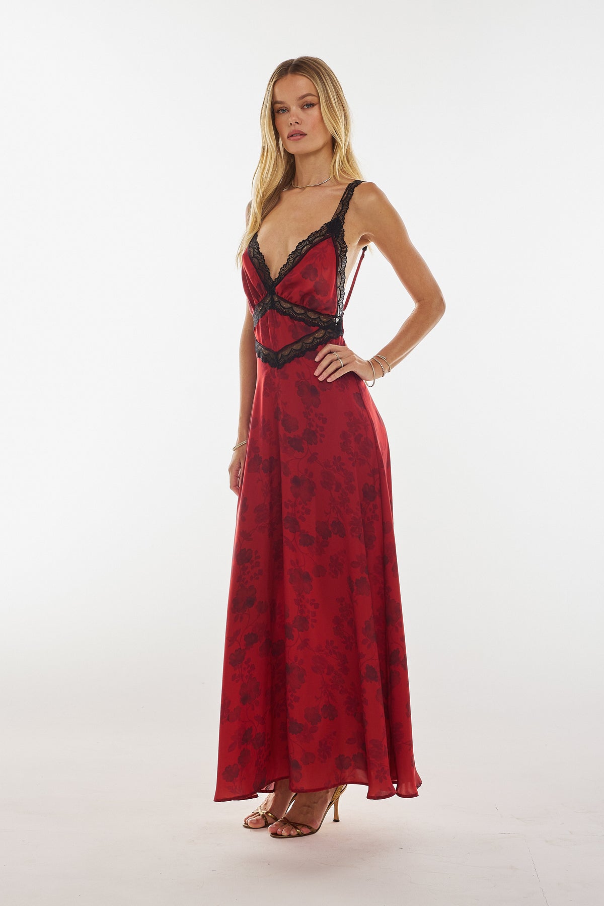 This is an image of Selena Dress in Red Currant - RESA featuring a model wearing the dress