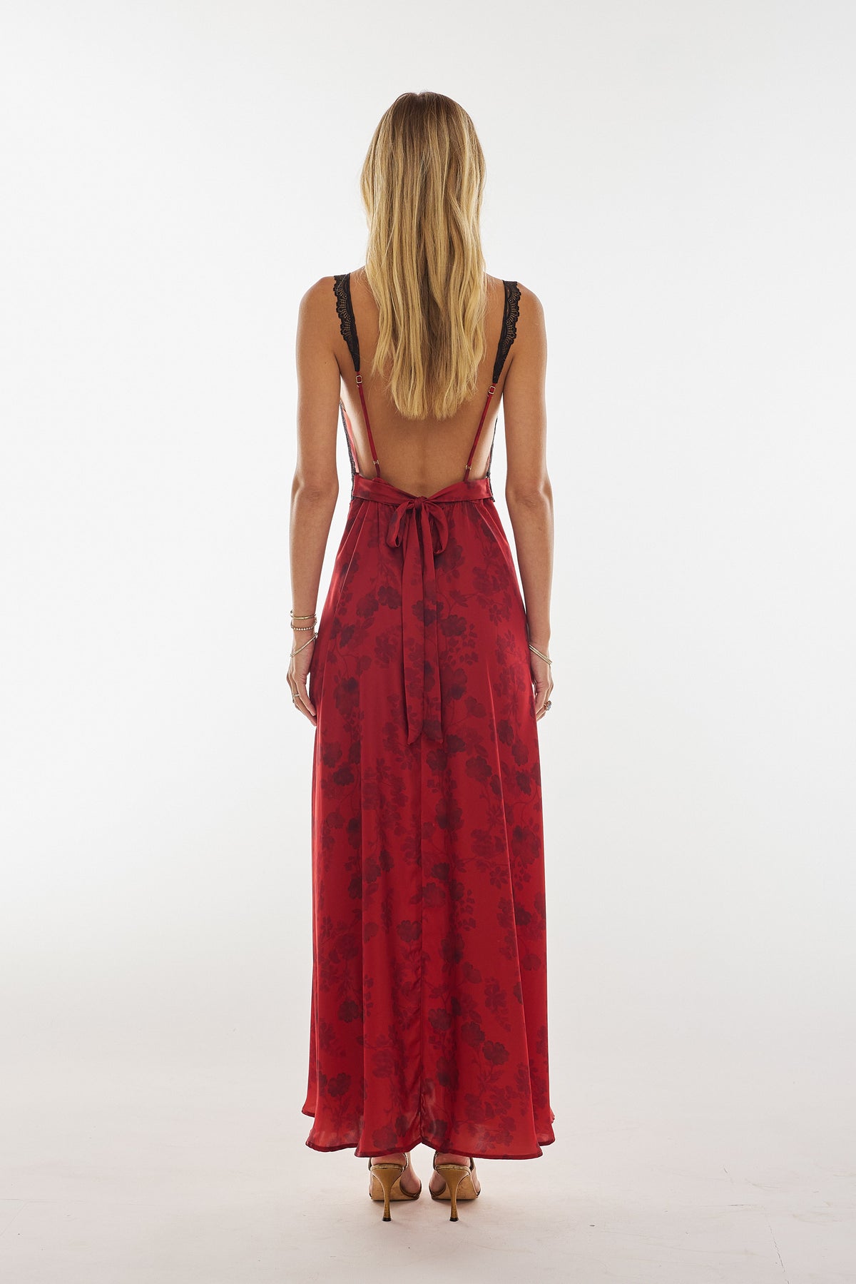 This is an image of Selena Dress in Red Currant - RESA featuring a model wearing the dress