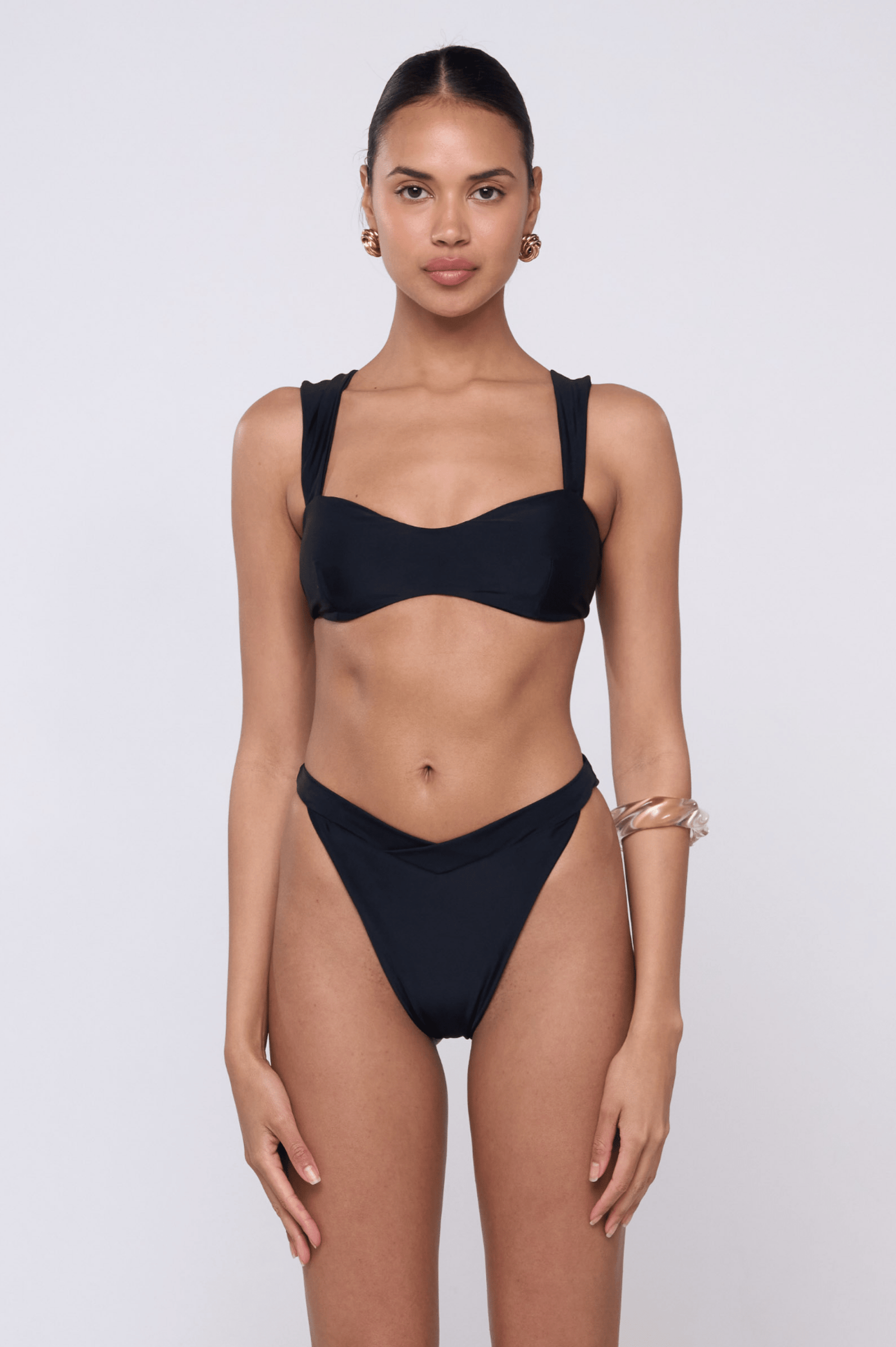 This is an image of Selma Bikini Top in Black - RESA featuring a model wearing the dress