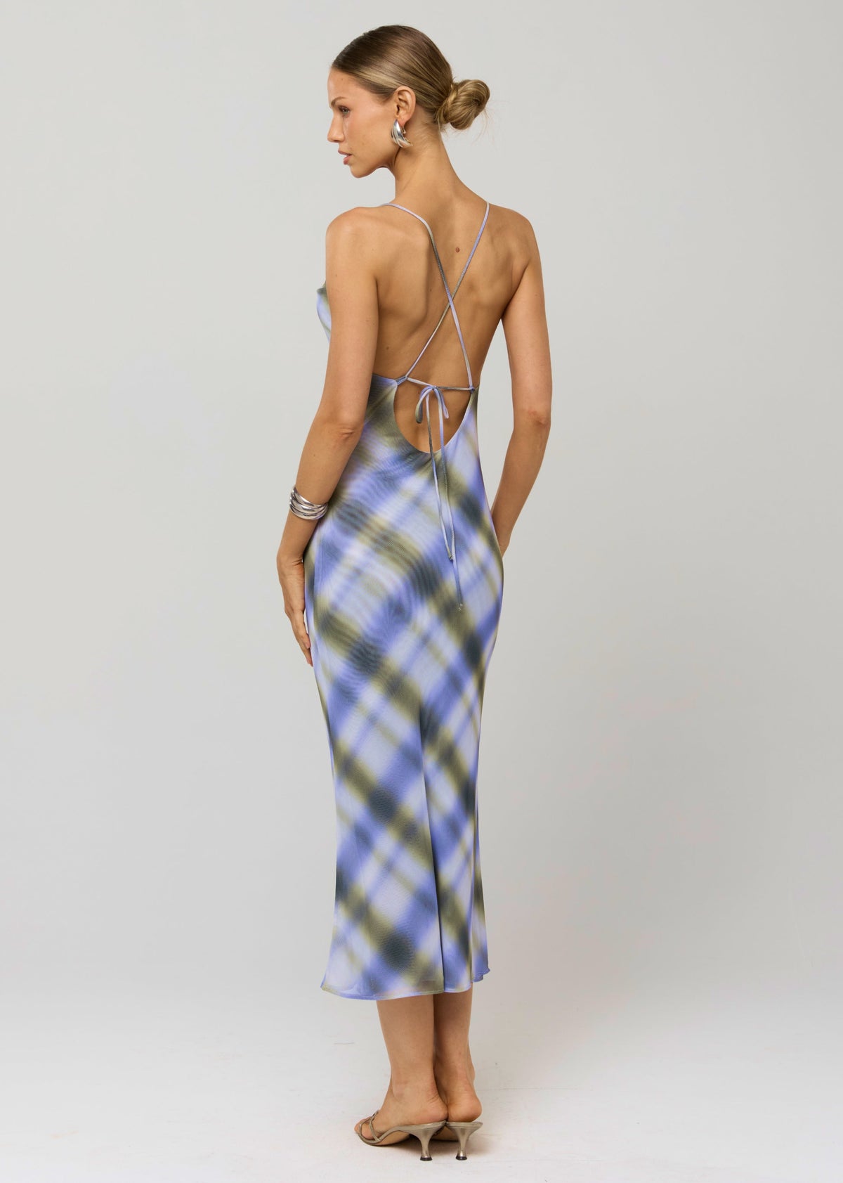 This is an image of Serena Dress in Blur - RESA featuring a model wearing the dress