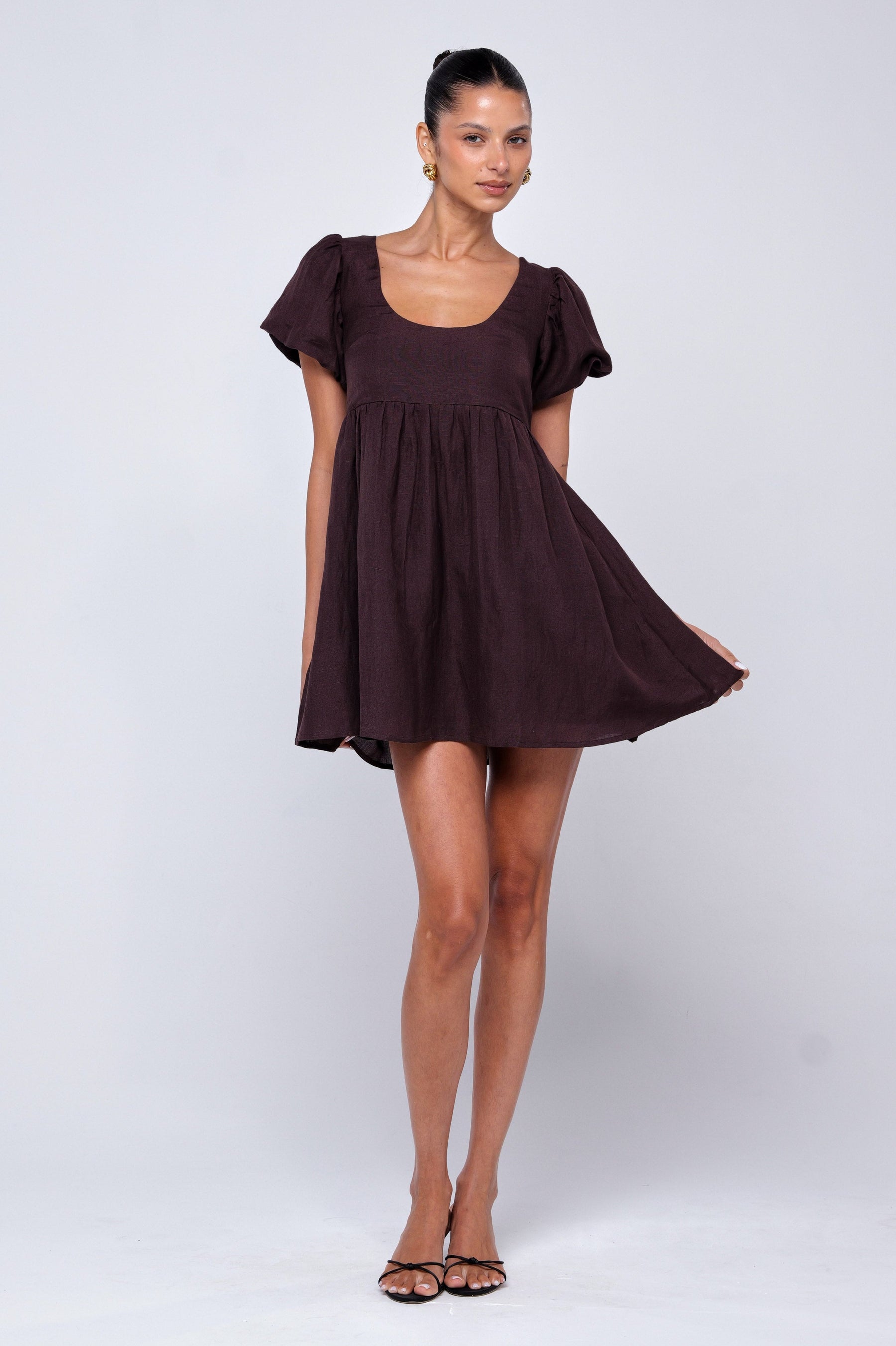 This is an image of Shay Mini in Brown Linen - RESA featuring a model wearing the dress
