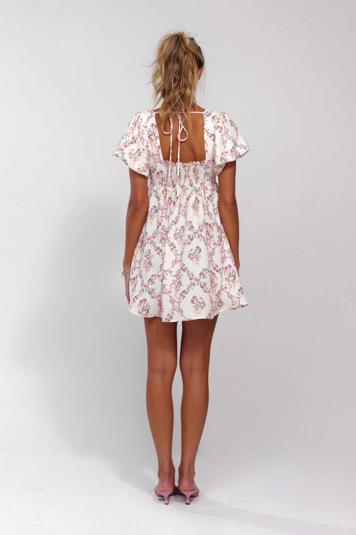 This is an image of Shay Mini in Romeo - RESA featuring a model wearing the dress