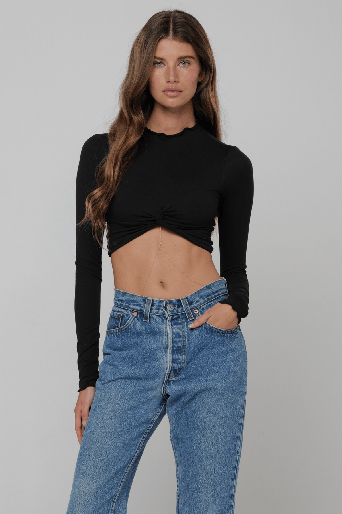 This is an image of Shelby Top in Black Knit - RESA featuring a model wearing the dress