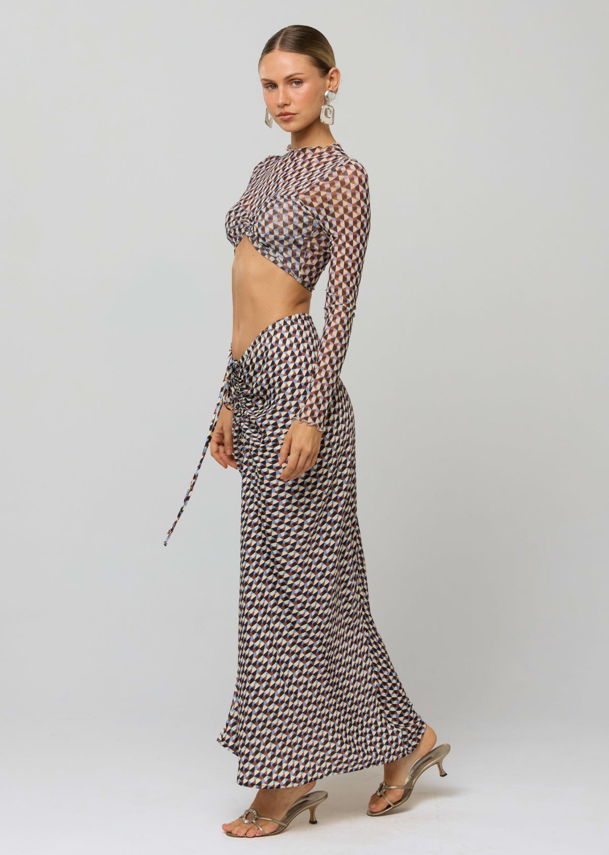 This is an image of Shelby Top in Mosiac - RESA featuring a model wearing the dress