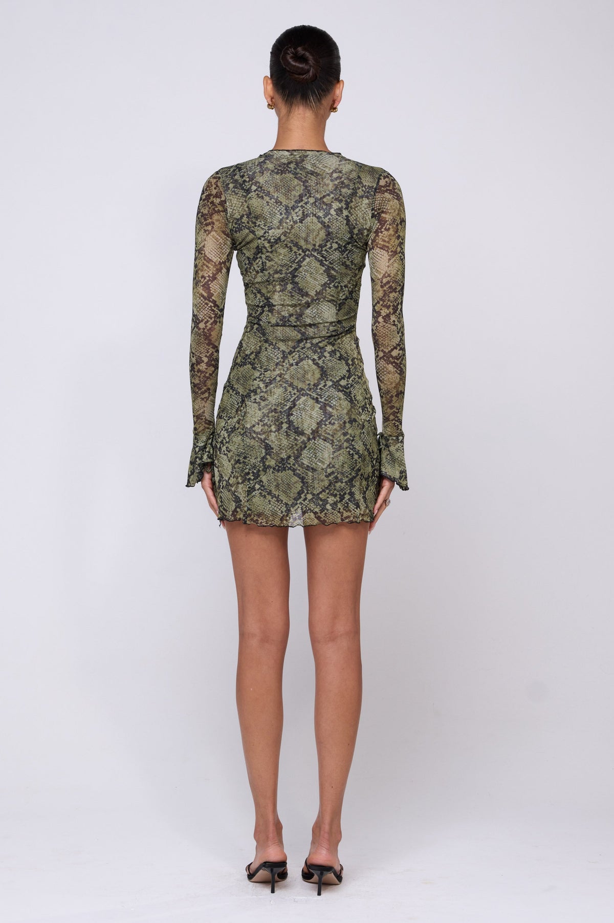 This is an image of Sloane Mini in Venom - RESA featuring a model wearing the dress