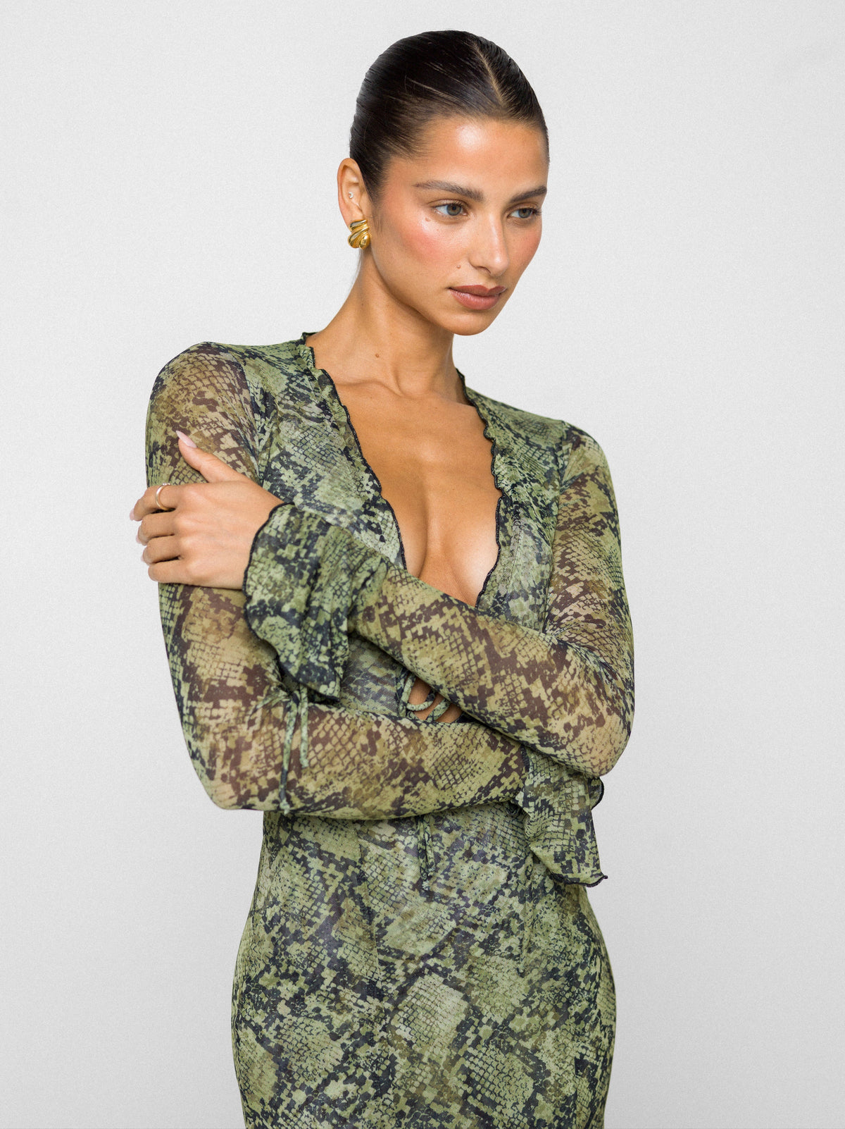 This is an image of Sloane Mini in Venom - RESA featuring a model wearing the dress